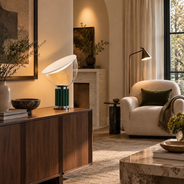 Bowl-shaped glass table lamp used as one low ambient layer in a balanced room