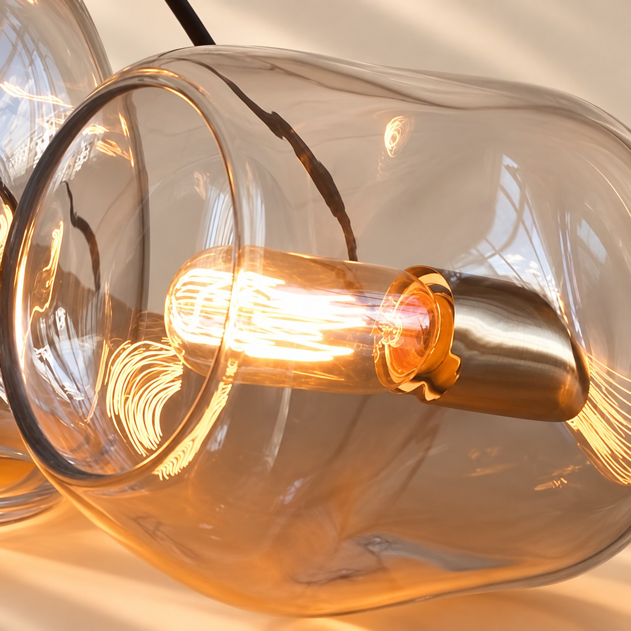 Hand-Blown Glass Globe Pendant with clear glass and two shade heights
