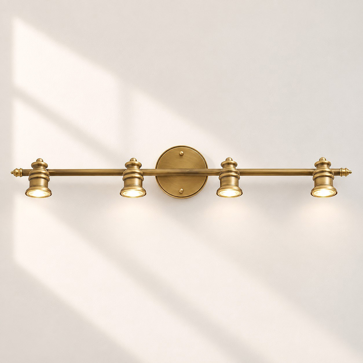 Aurelia Brass Vanity Wall Light with one to five heads and natural brass