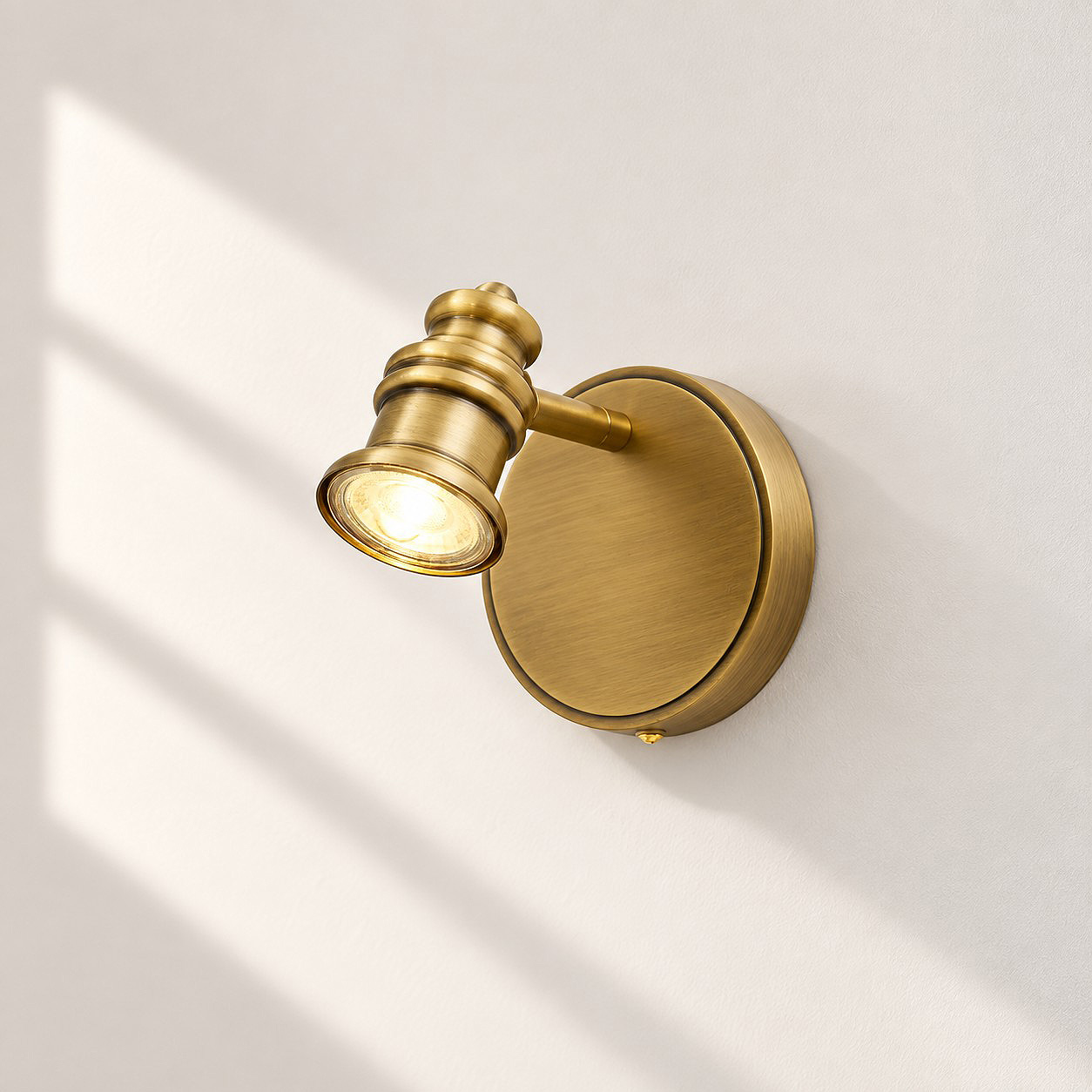 Aurelia Brass Vanity Wall Light with one to five heads and natural brass