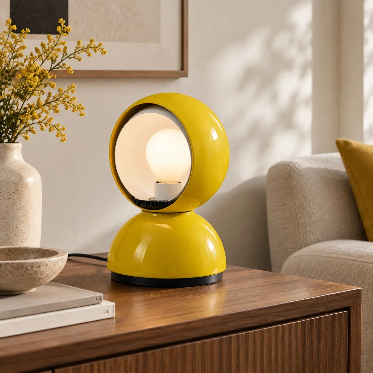 Transparent crystal sphere table lamp over a bay-window dining table