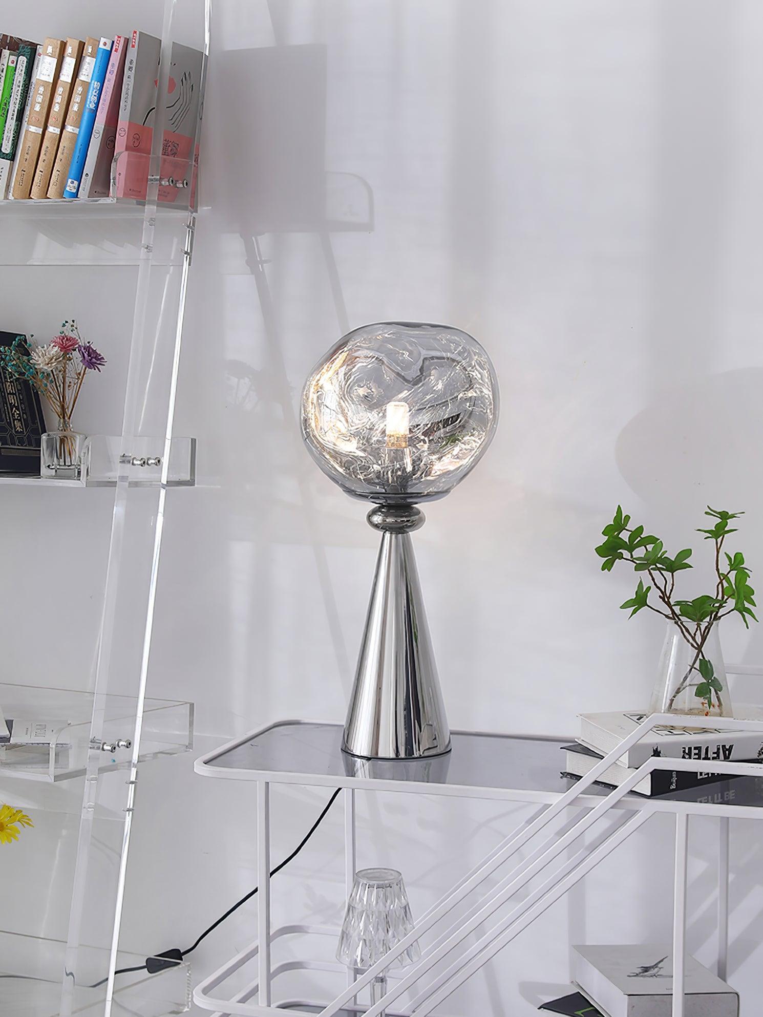 Chrome and silver Lampa stolowa Lava Cone in a bright interior