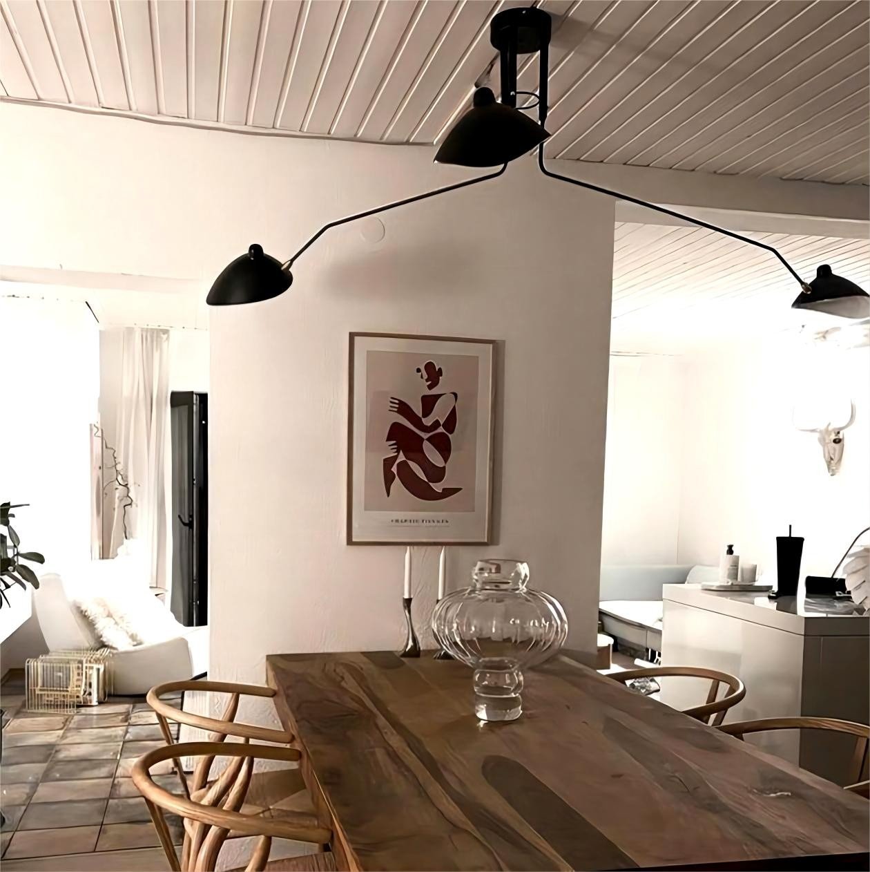 Black Adjustable Ceiling Light in a square interior scene