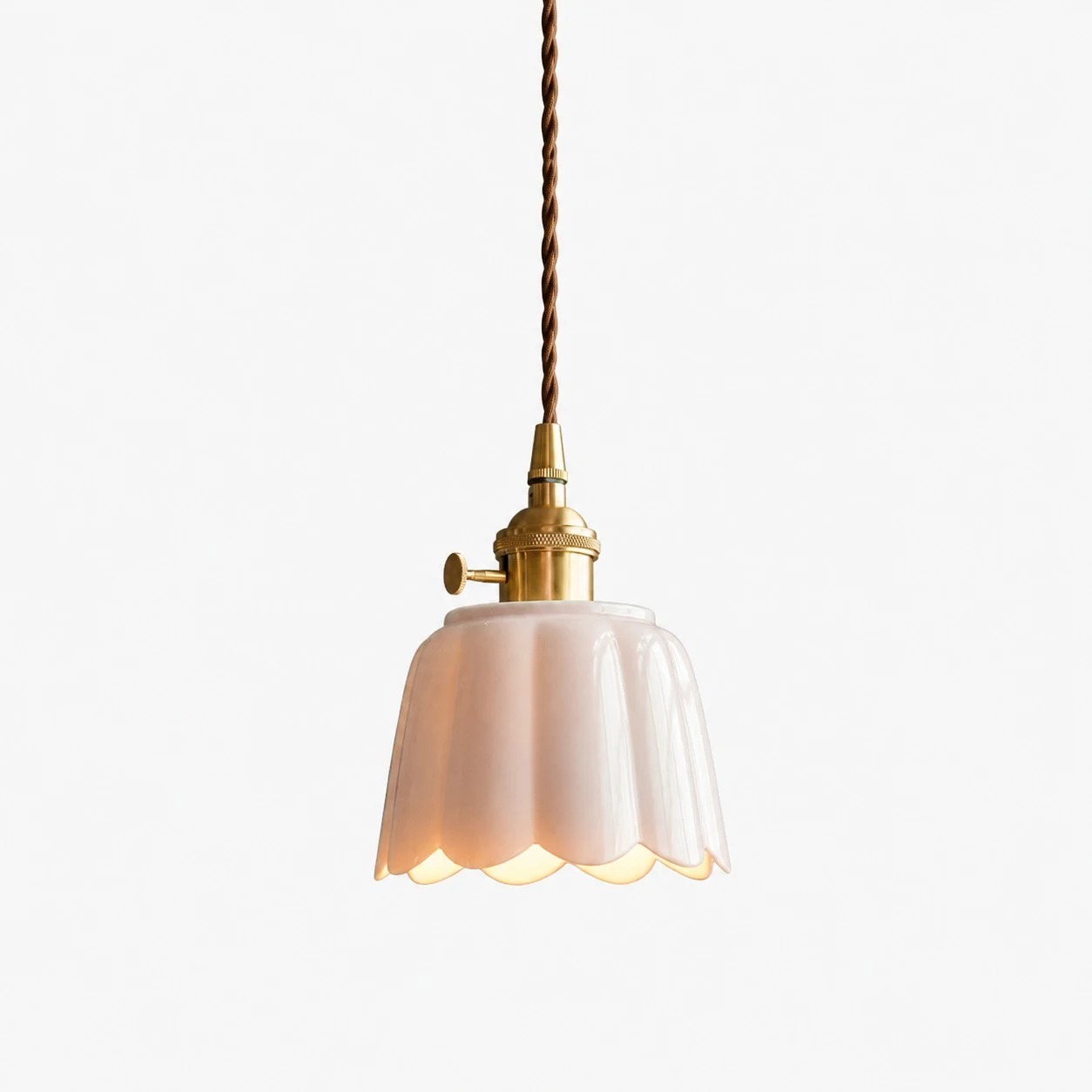 Sakura pink glaze ceramic lotus pendant light on clean background