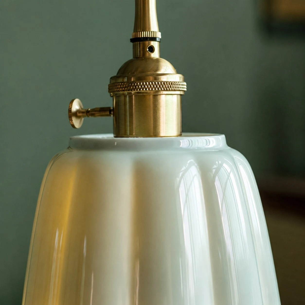 Metal holder and ceramic lotus shade detail