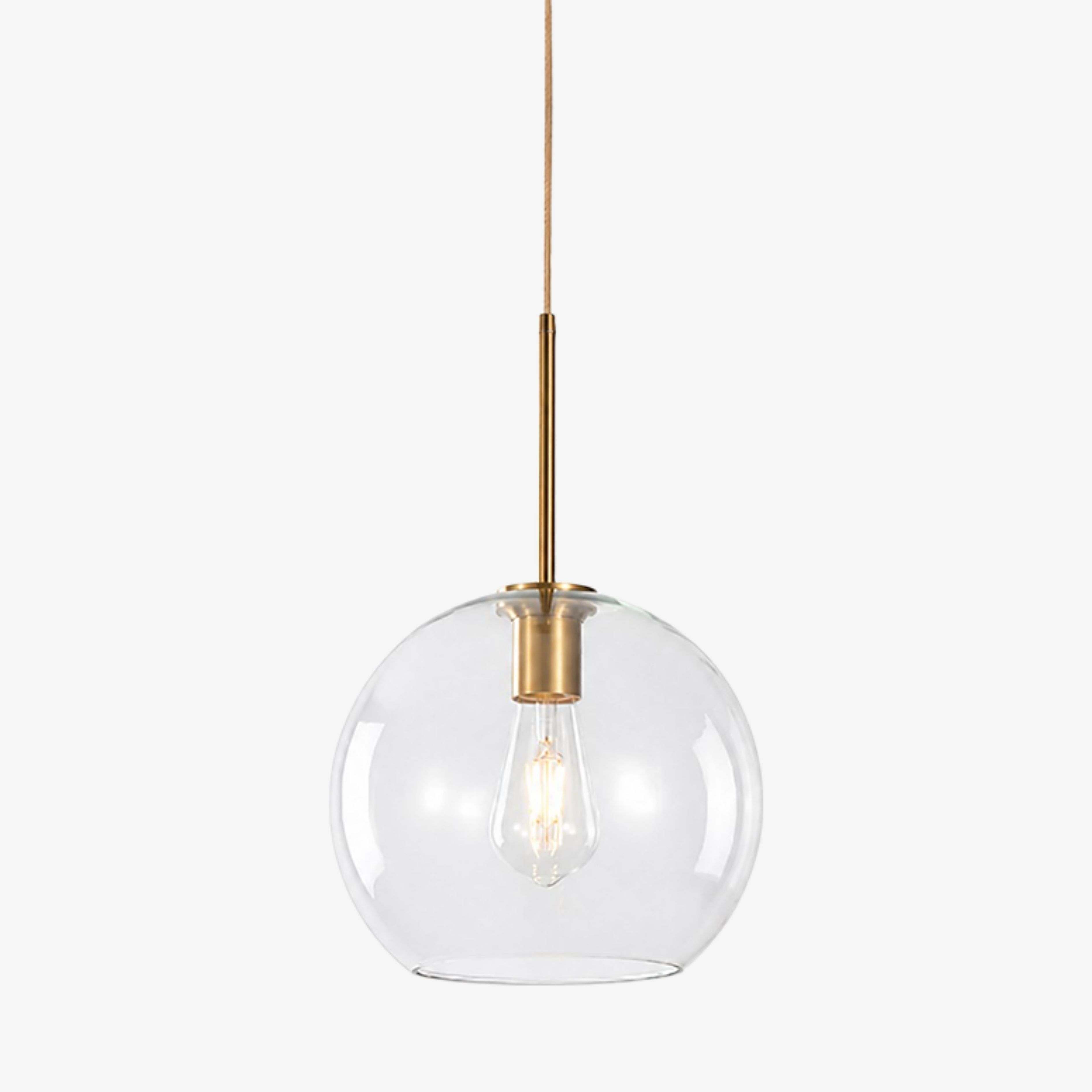 Clear Luma Collection globe pendant light with brass finish