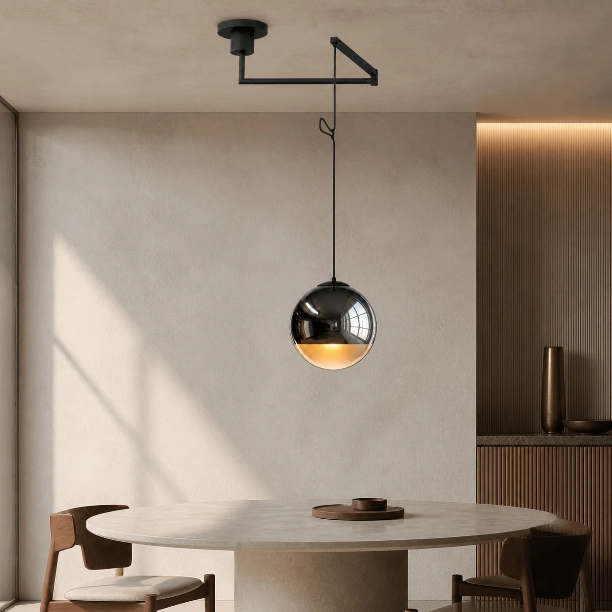 Style B swing-arm Luma pendant above a dining table