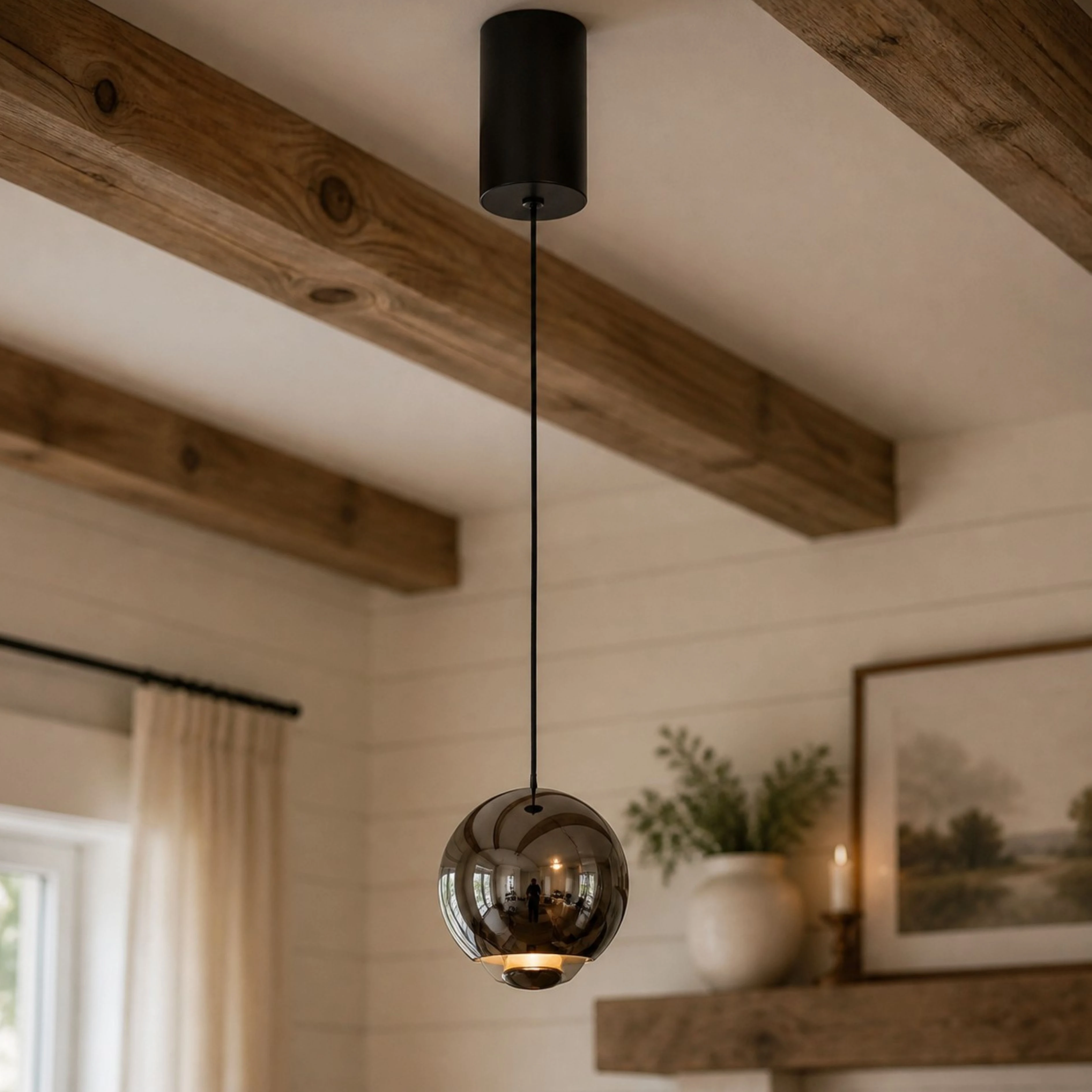Pearl Black orb pendant in a warm rustic interior