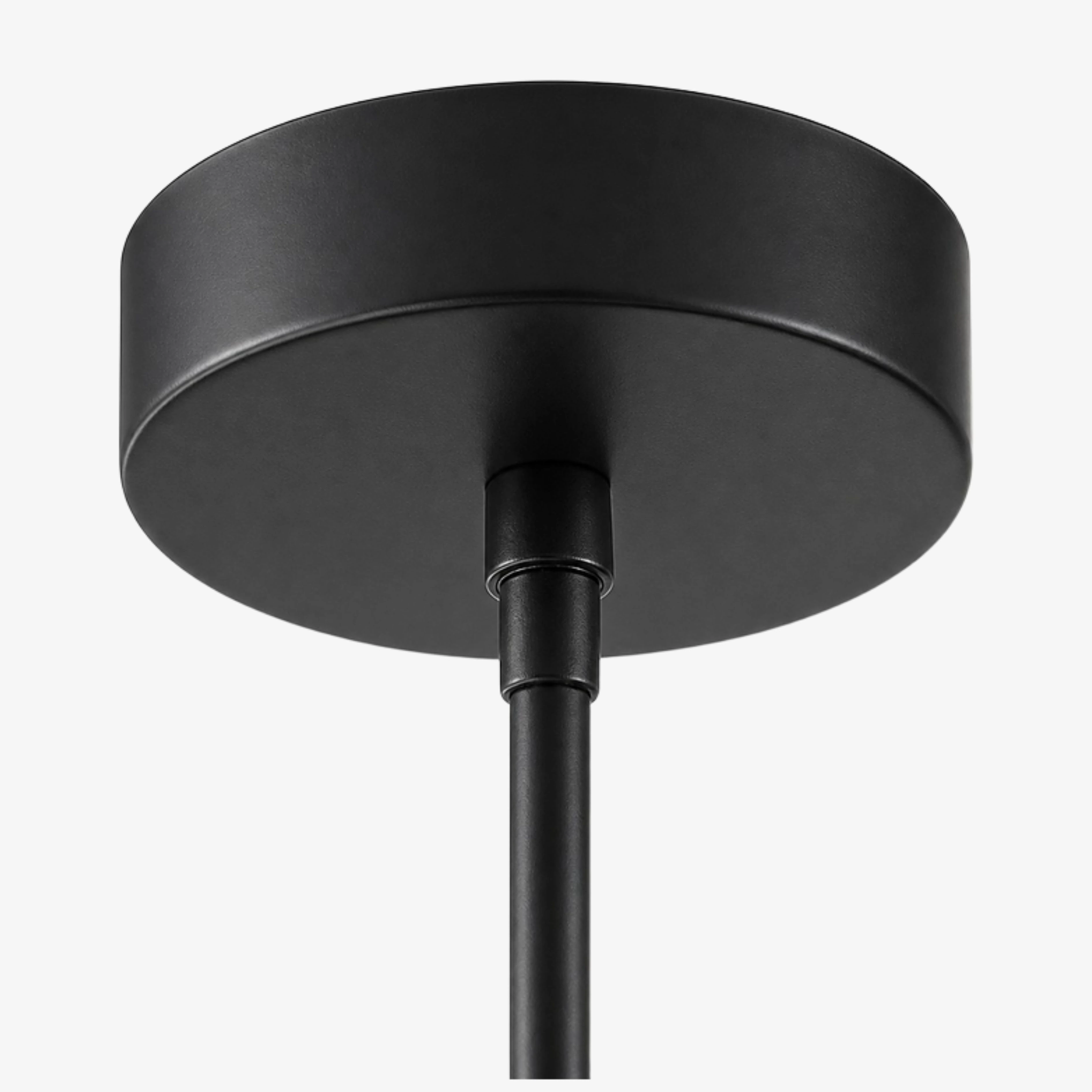 Black metal ceiling canopy detail on Luma pendant light