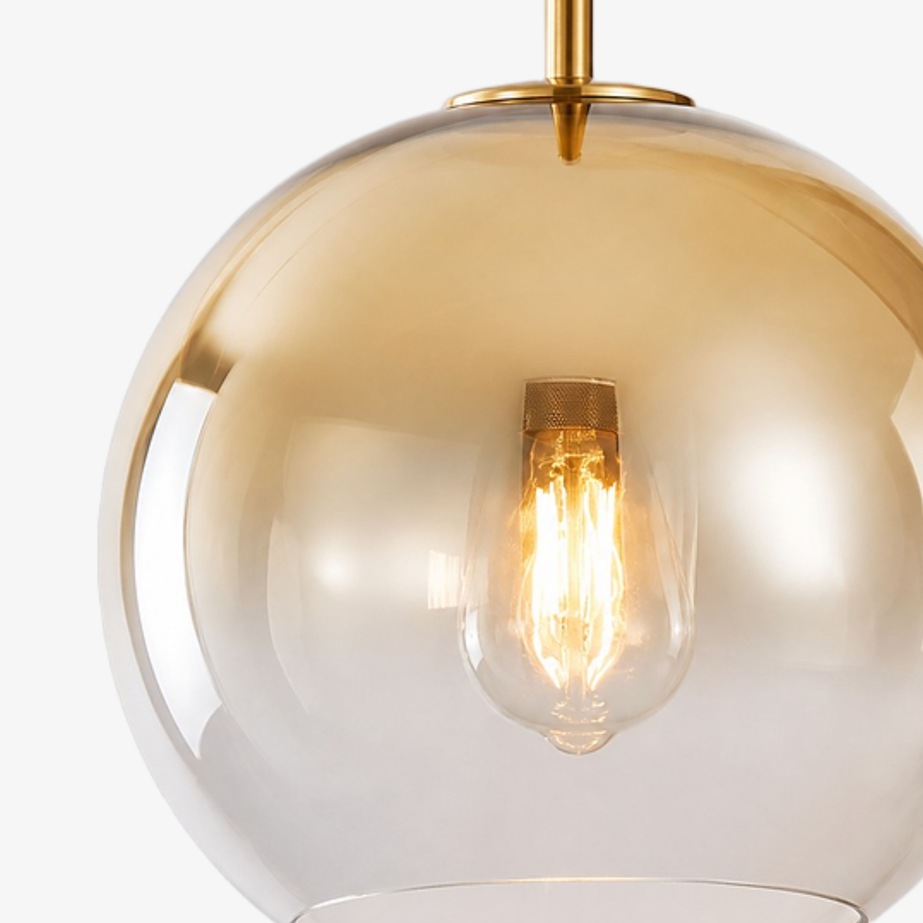 Gradient Gold glass shade and illuminated bulb detail