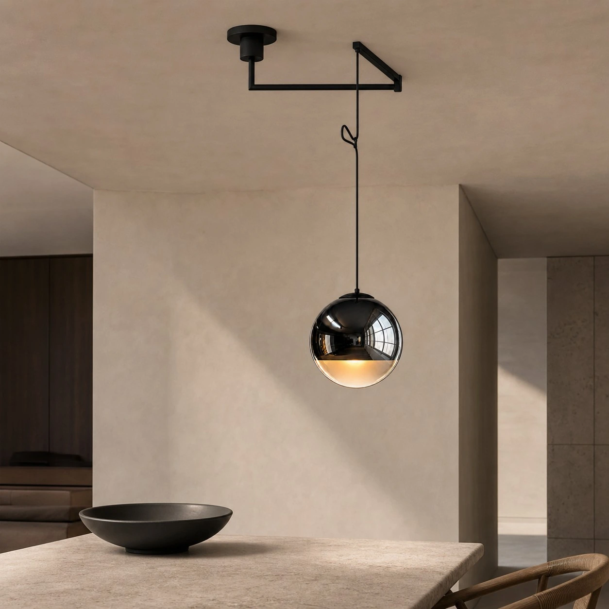 Style B swing-arm Luma pendant above a kitchen island
