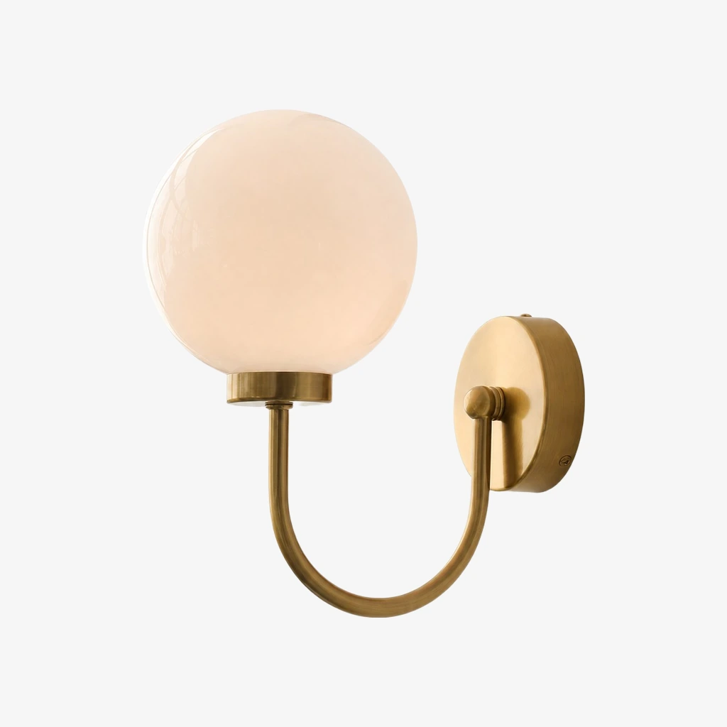 Style A Luma opal globe wall sconce in Natural Brass