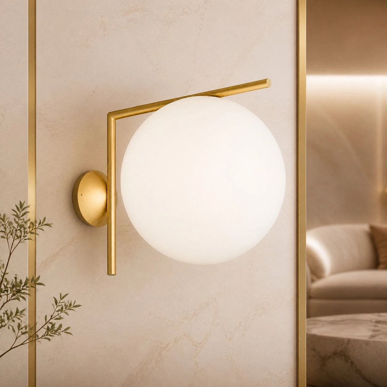 Gold offset globe wall sconce in a bedroom