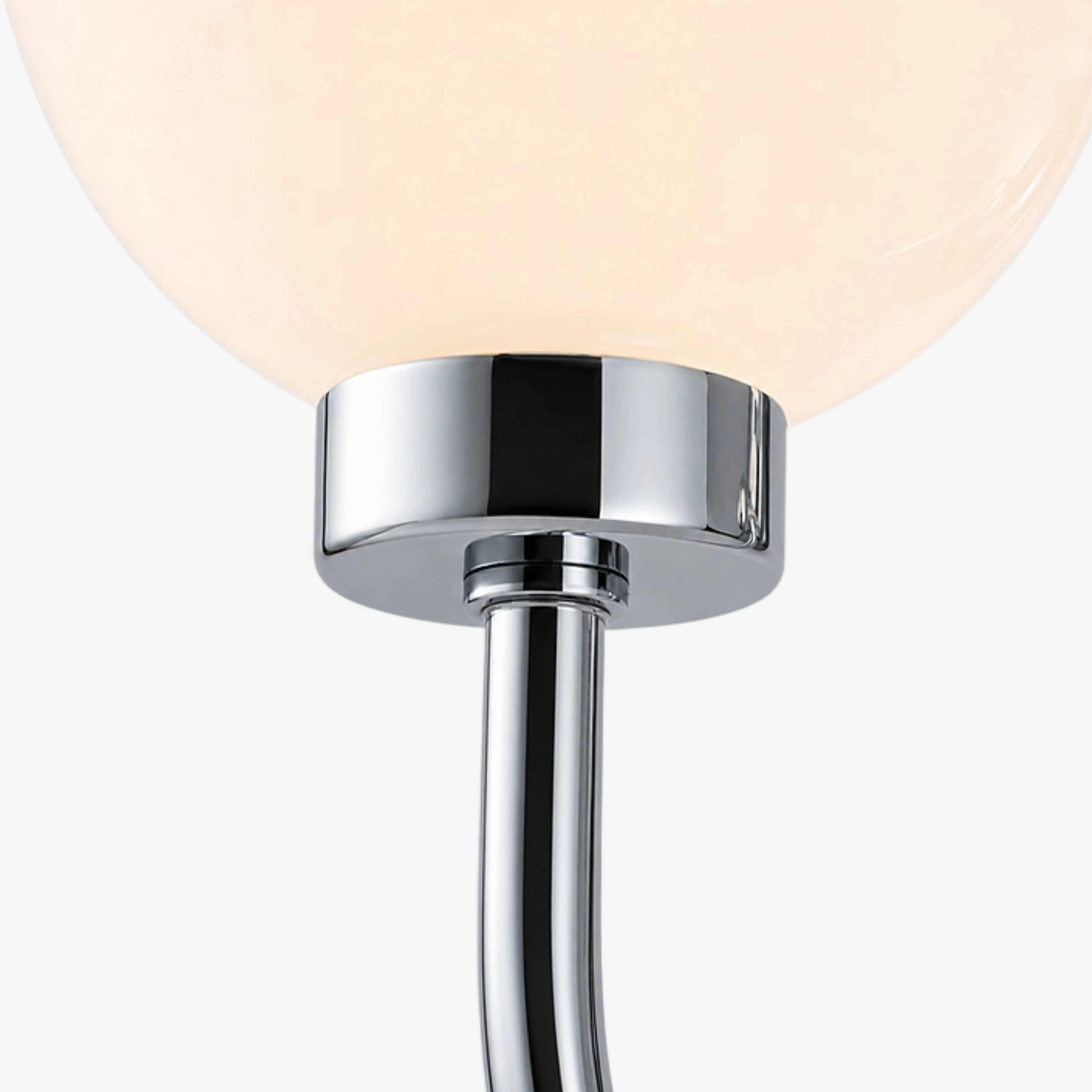 Chrome globe seat and curved arm detail