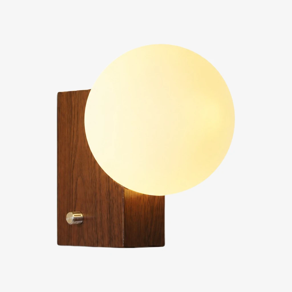 Luma folded globe wall sconce in Walnut
