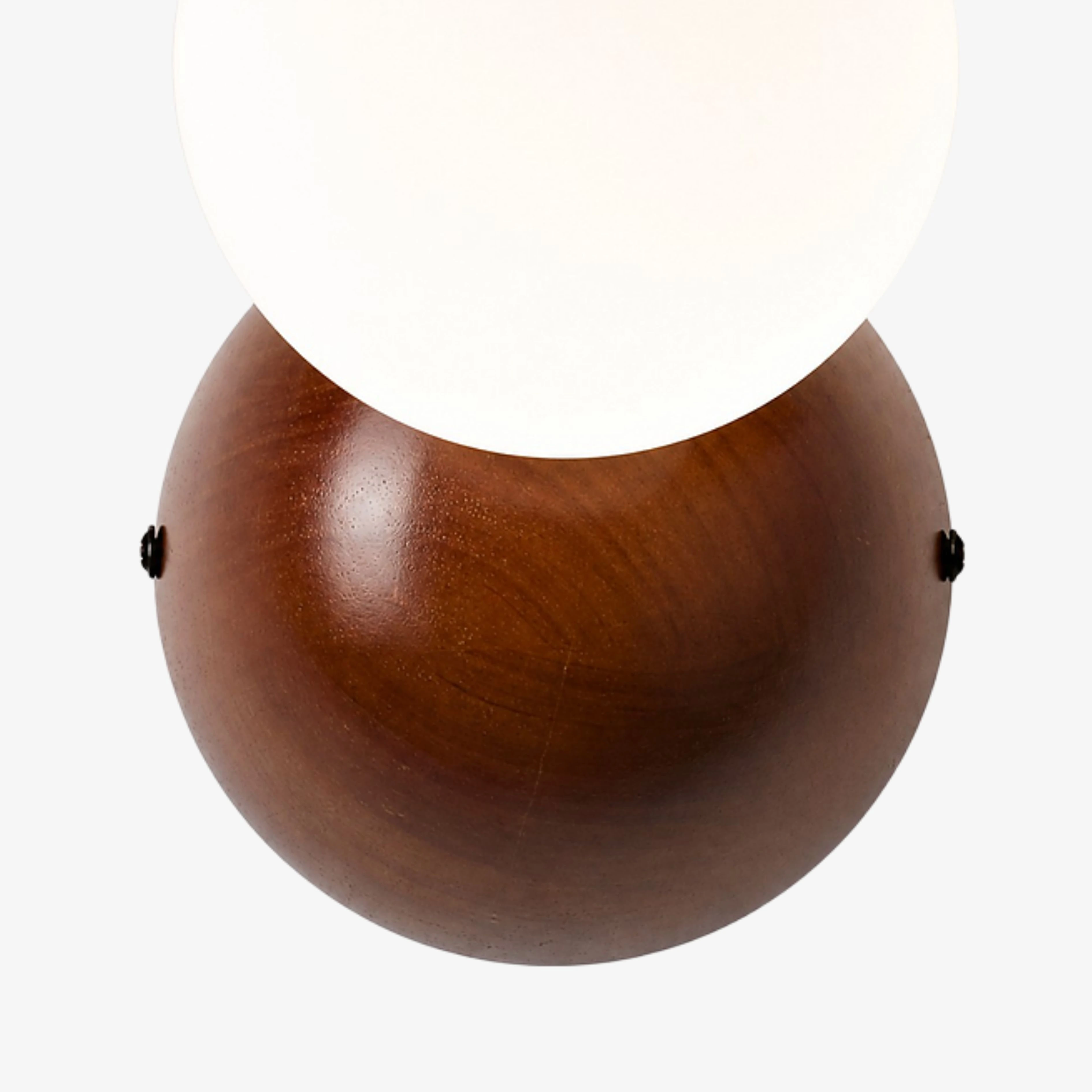 Walnut-finished rounded wood backplate detail