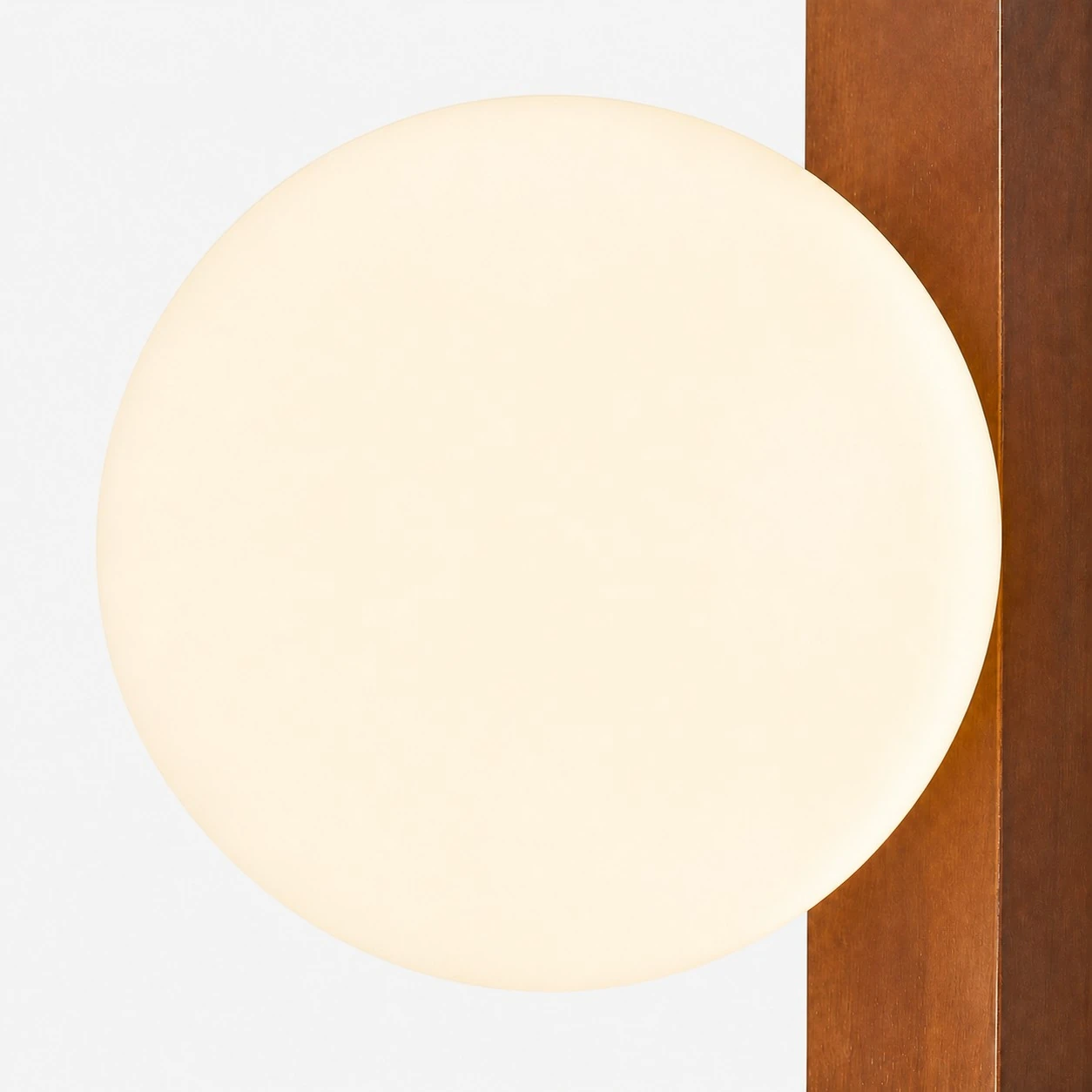 Close view of the opal glass globe and Walnut rail