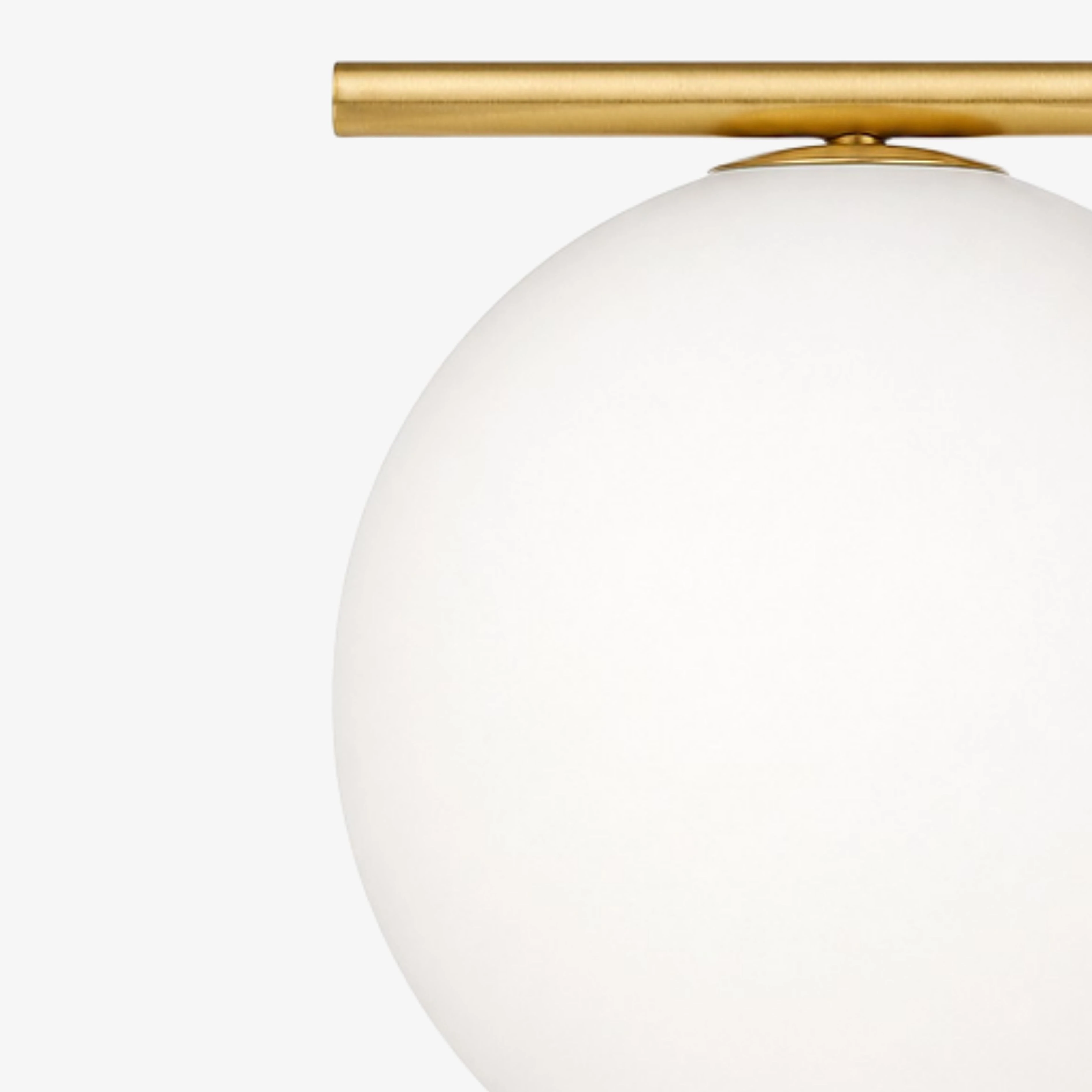 Close view of the opal glass globe and upper Gold support