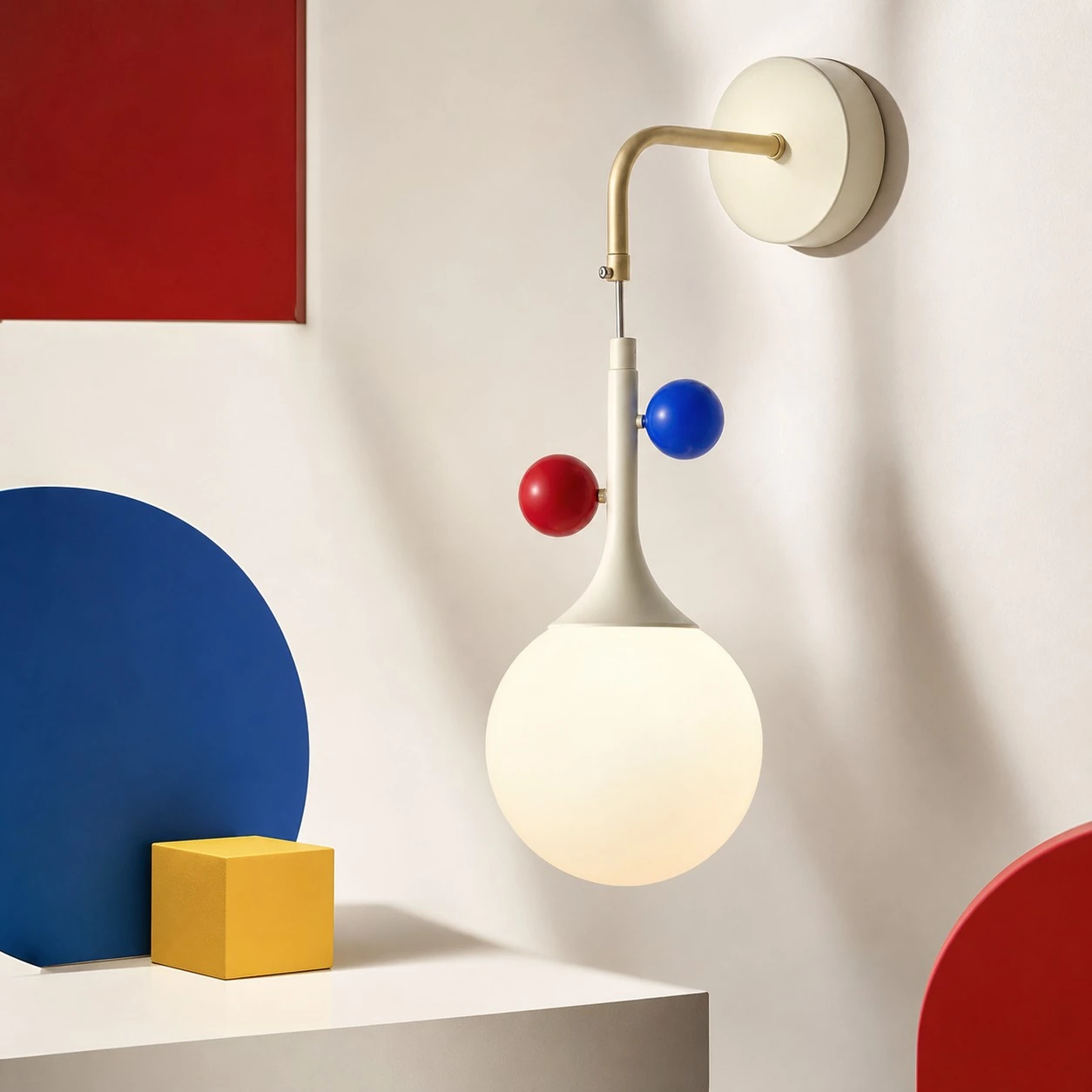 Cream orbit-disc wall sconce in a graphic interior