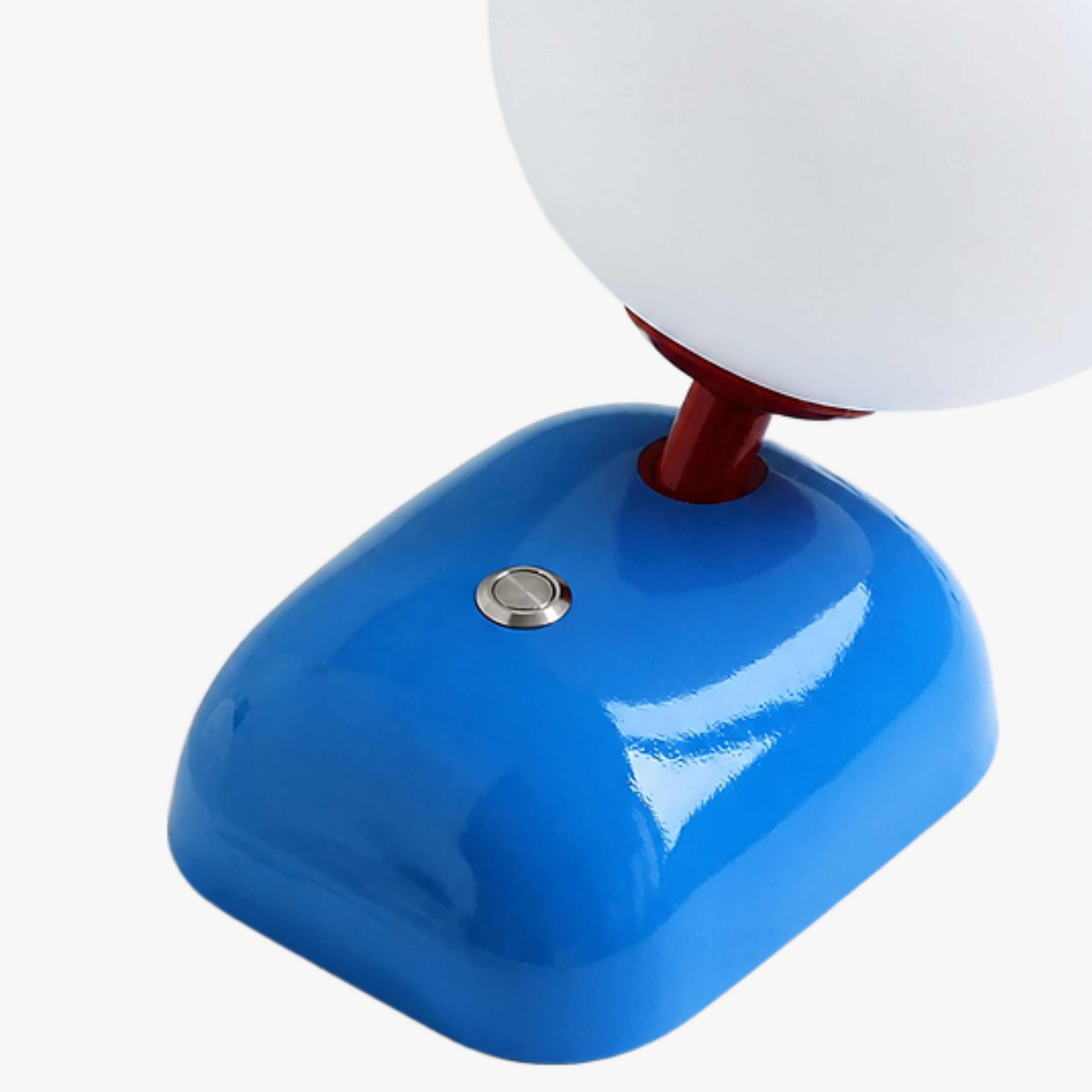 Blue compact wall sconce housing and switch detail