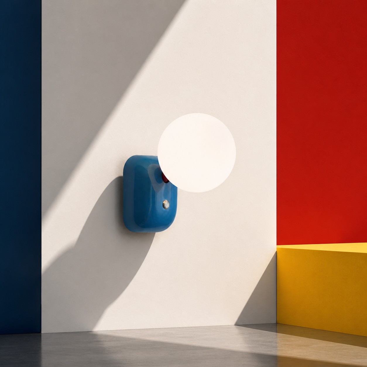 Luma Blue compact globe wall sconce in a color-block interior