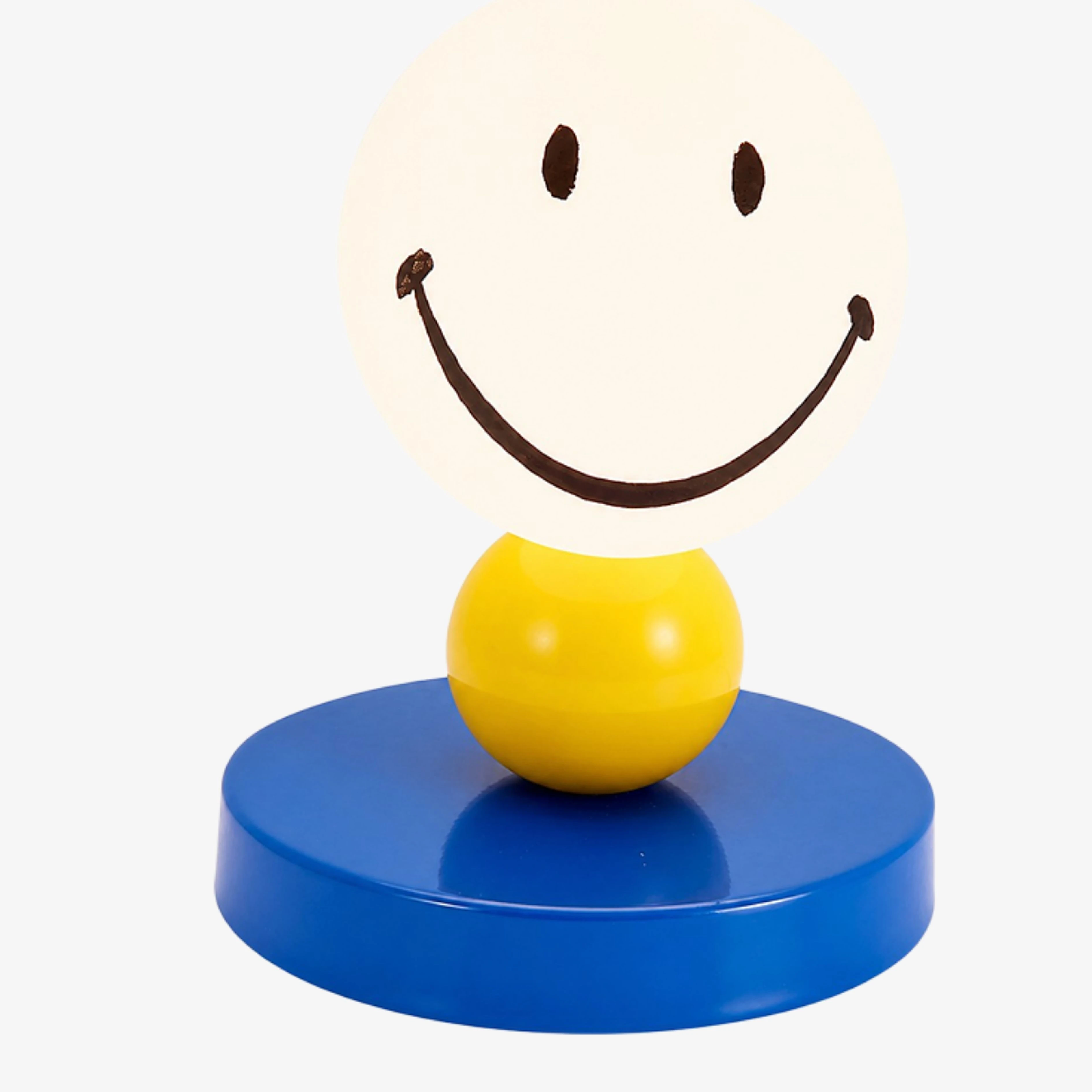 Close view of the yellow sphere and blue metal base