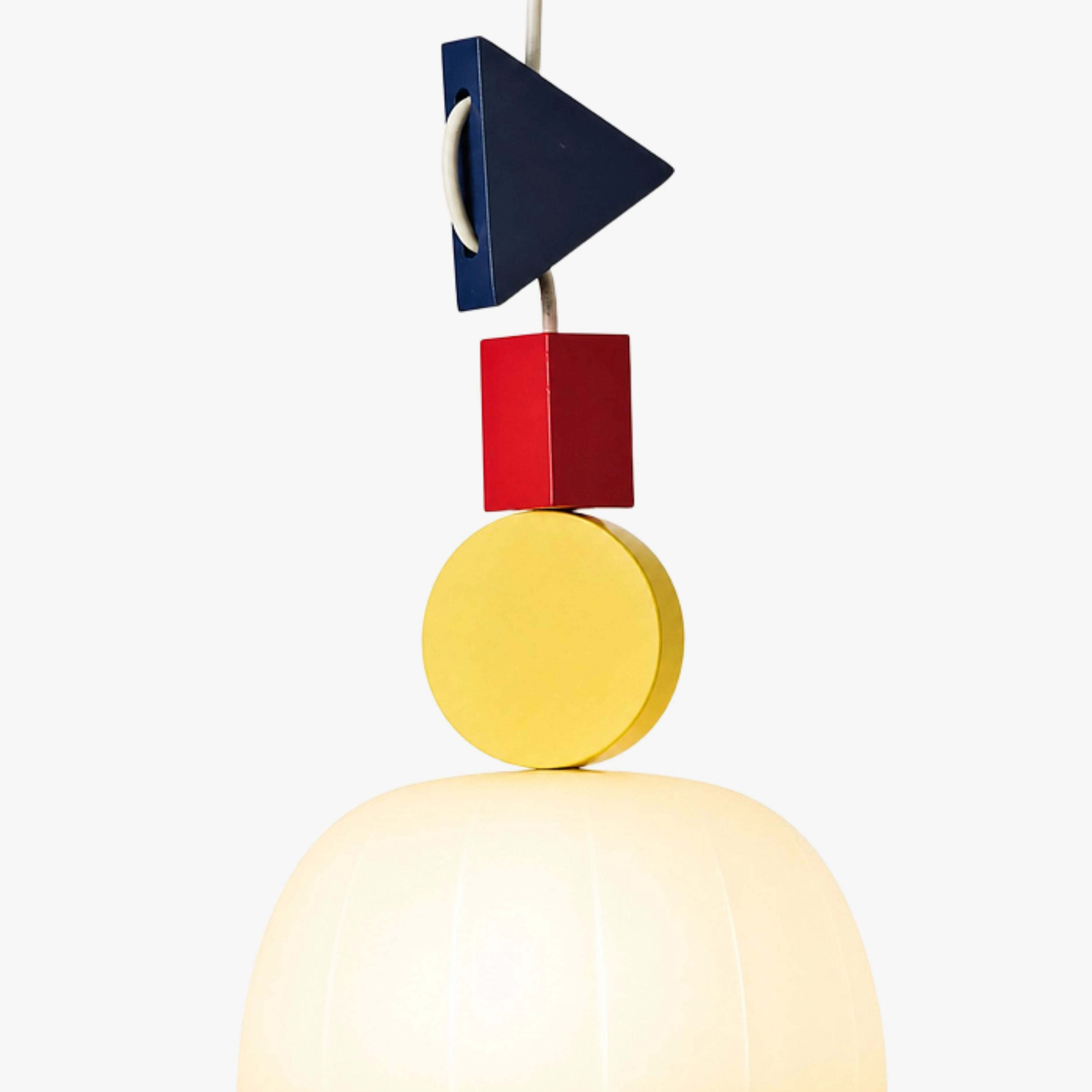 Close view of the blue, red, and yellow suspended geometry