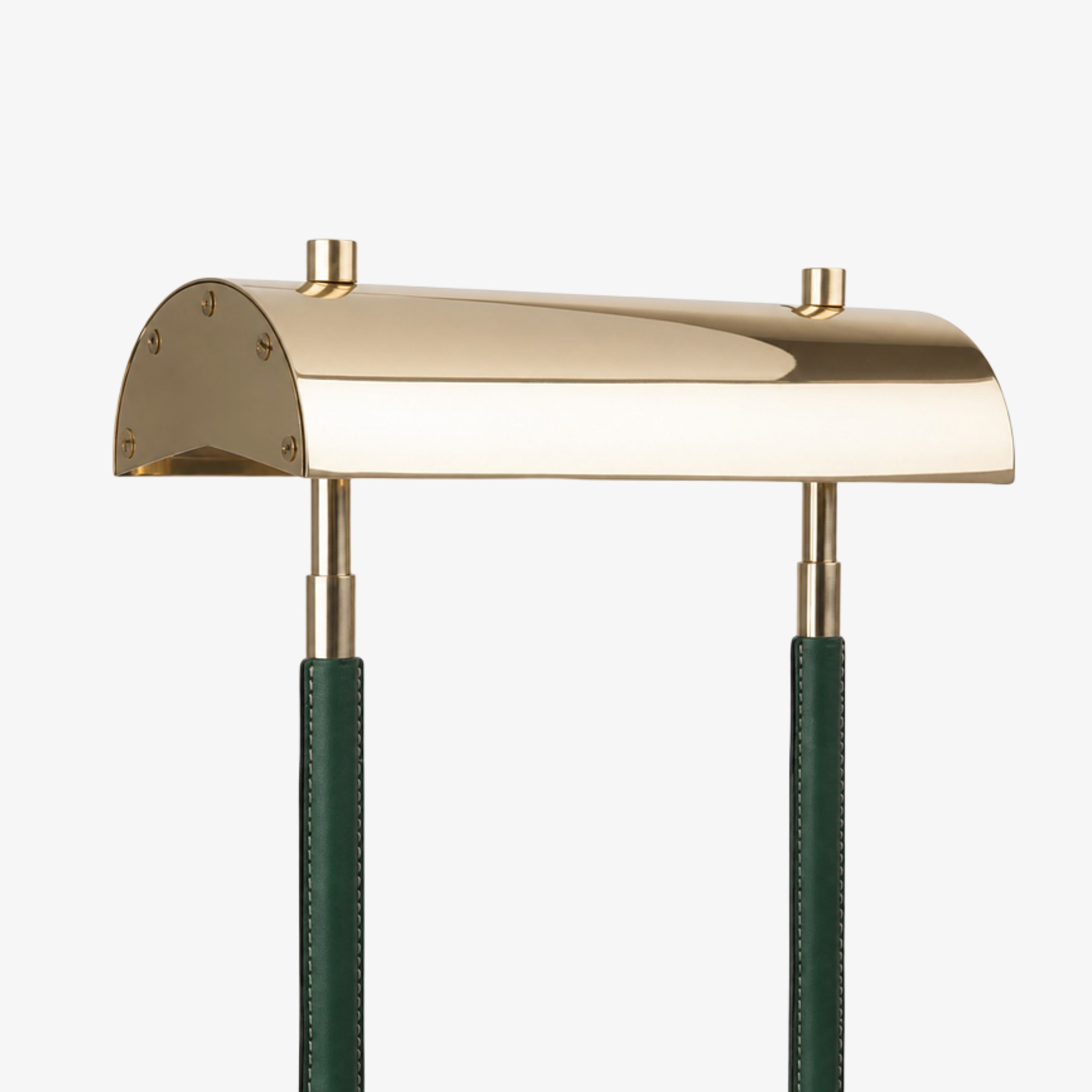 Polished curved metal table lamp shade detail