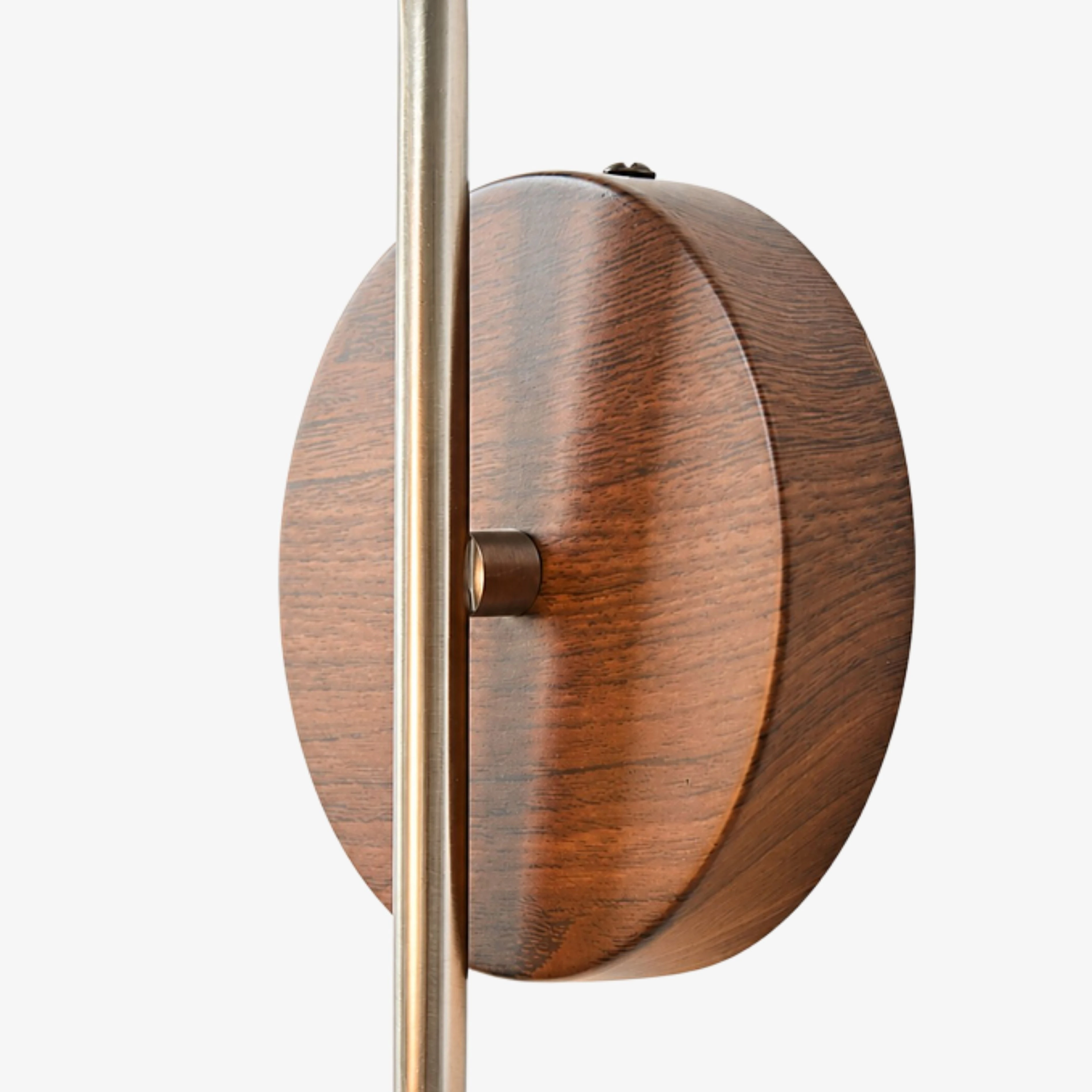 Close view of the round wood-look wall plate