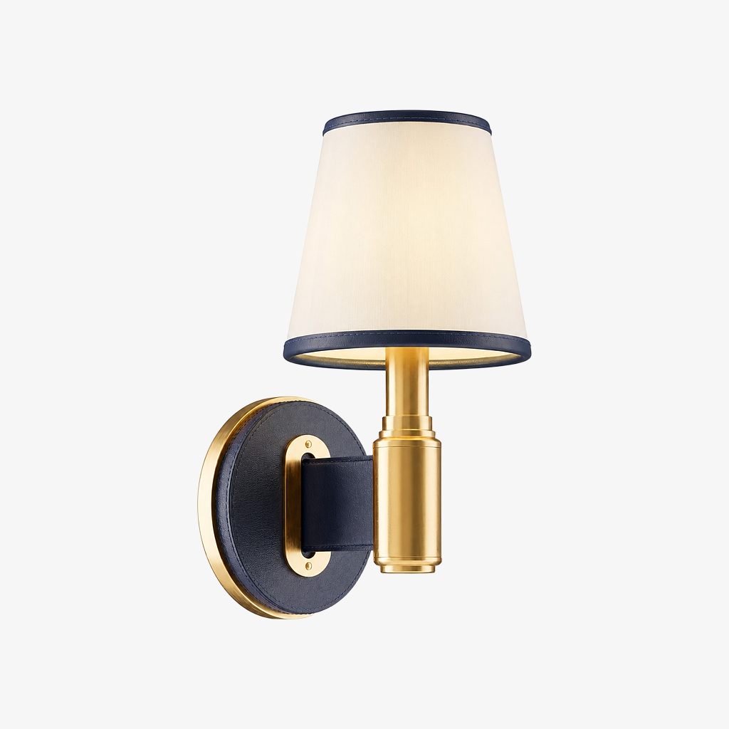 Navy leather and brass wall lamp with cream fabric shade