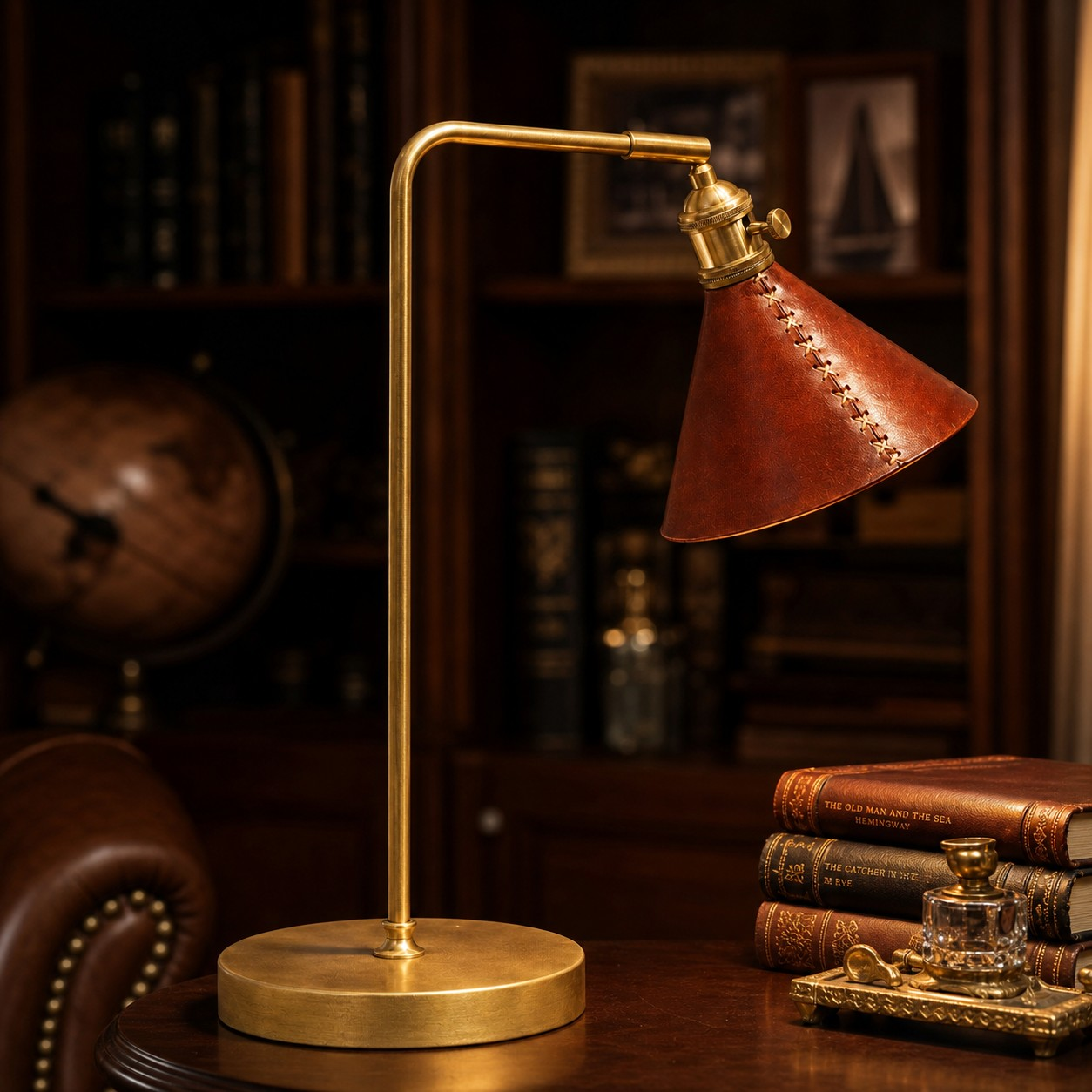 Standard leather and brass table lamp on a study table