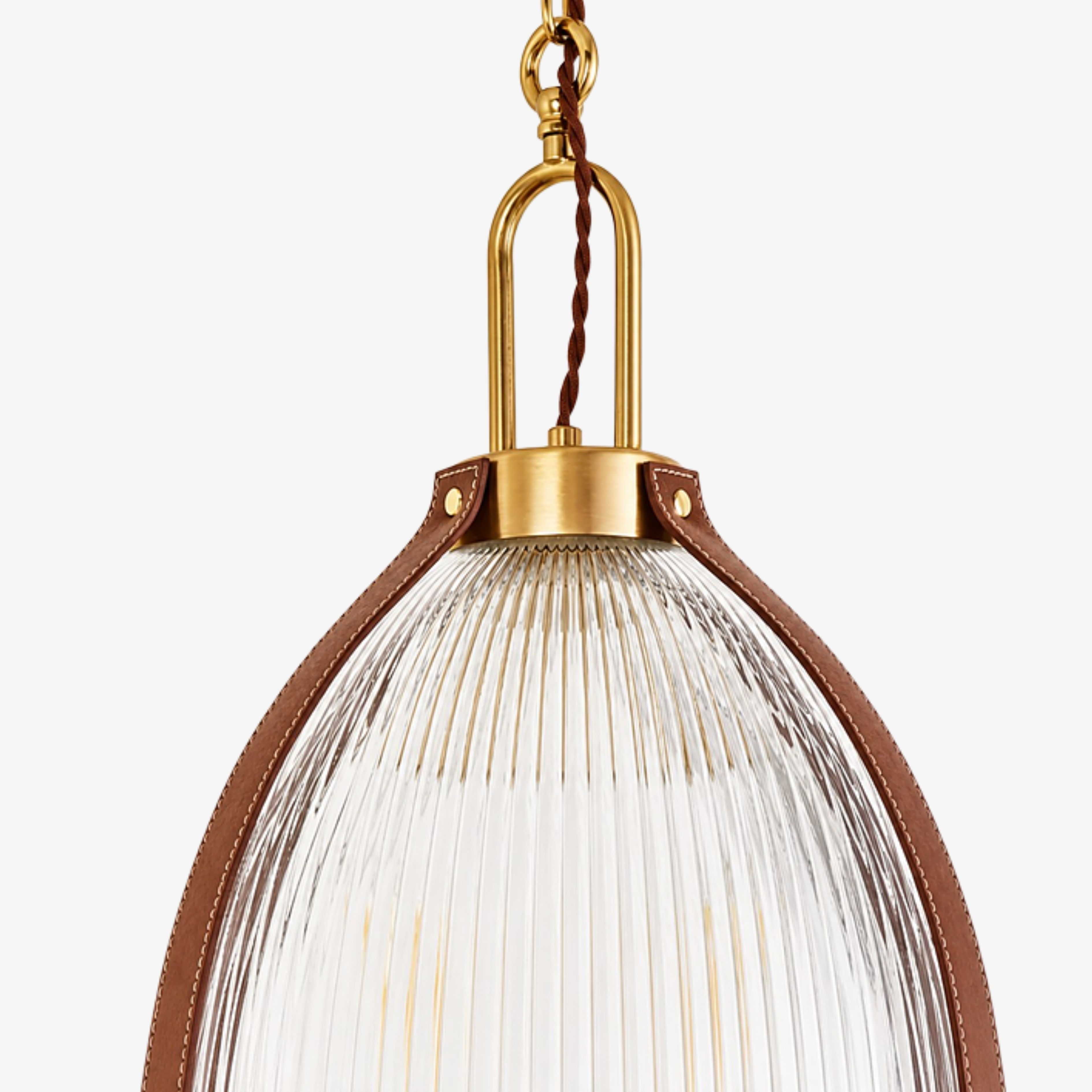 Antique brass hanger and stitched leather support detail
