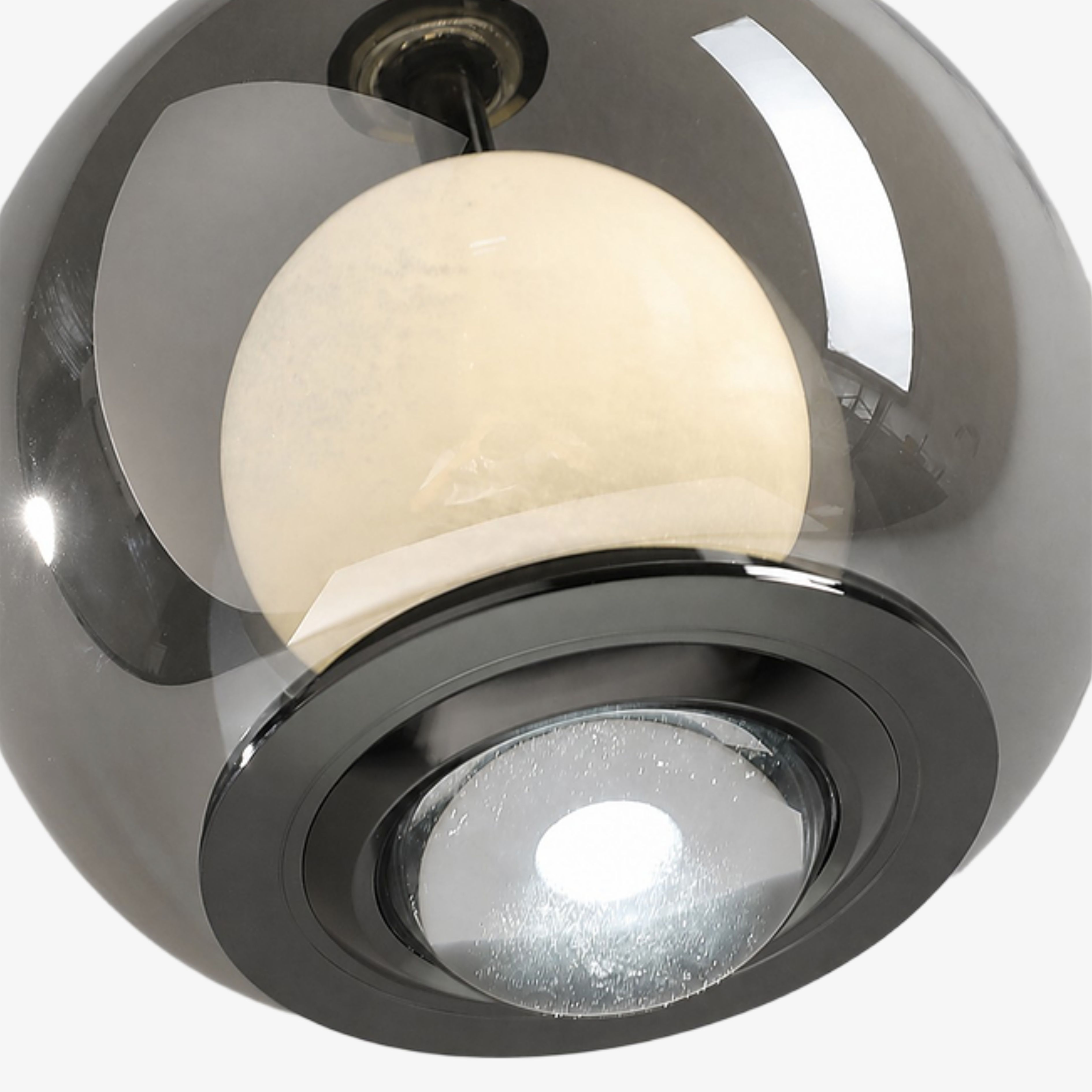 Close view of the lower circular lens beneath the globe
