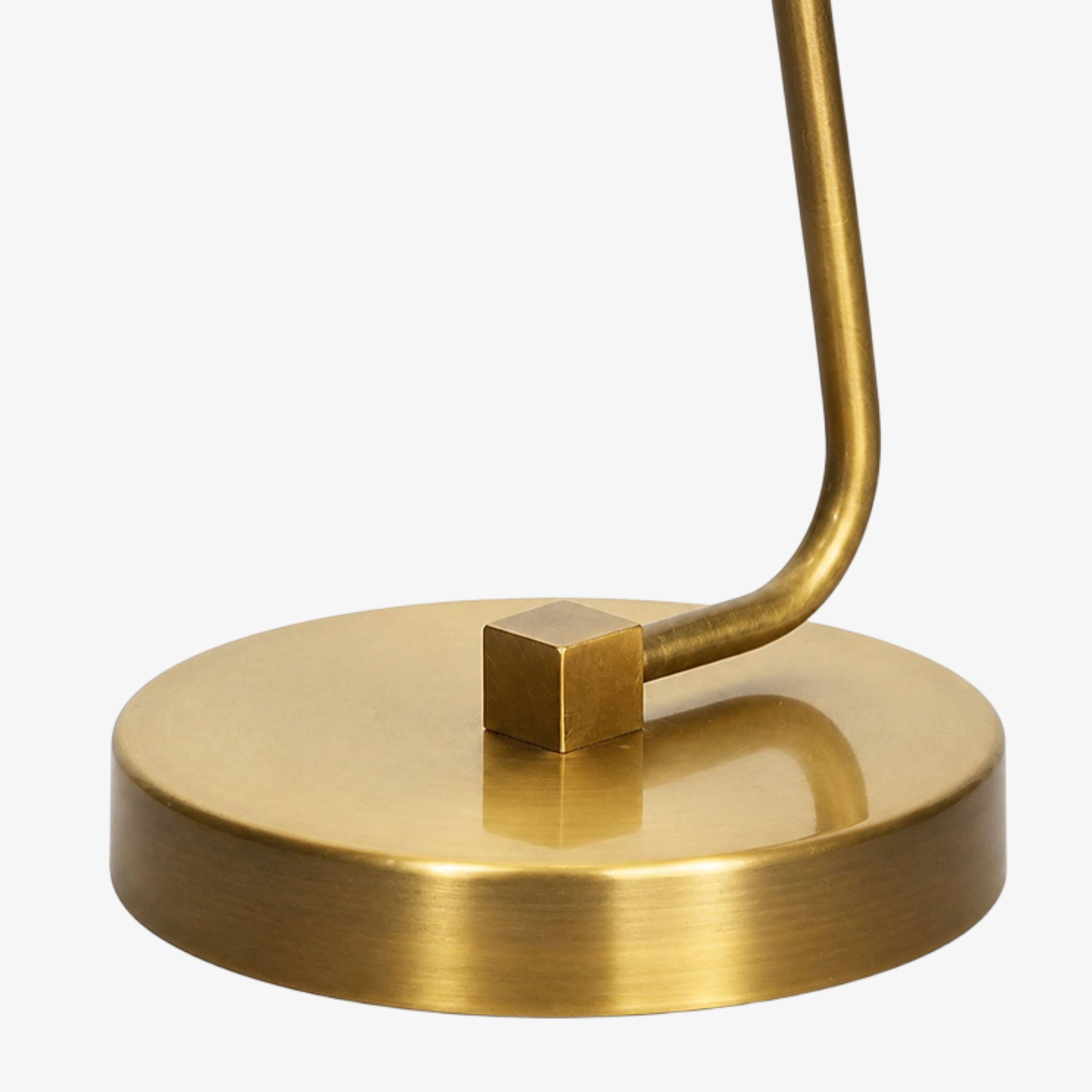 Antique brass circular base and curved frame detail