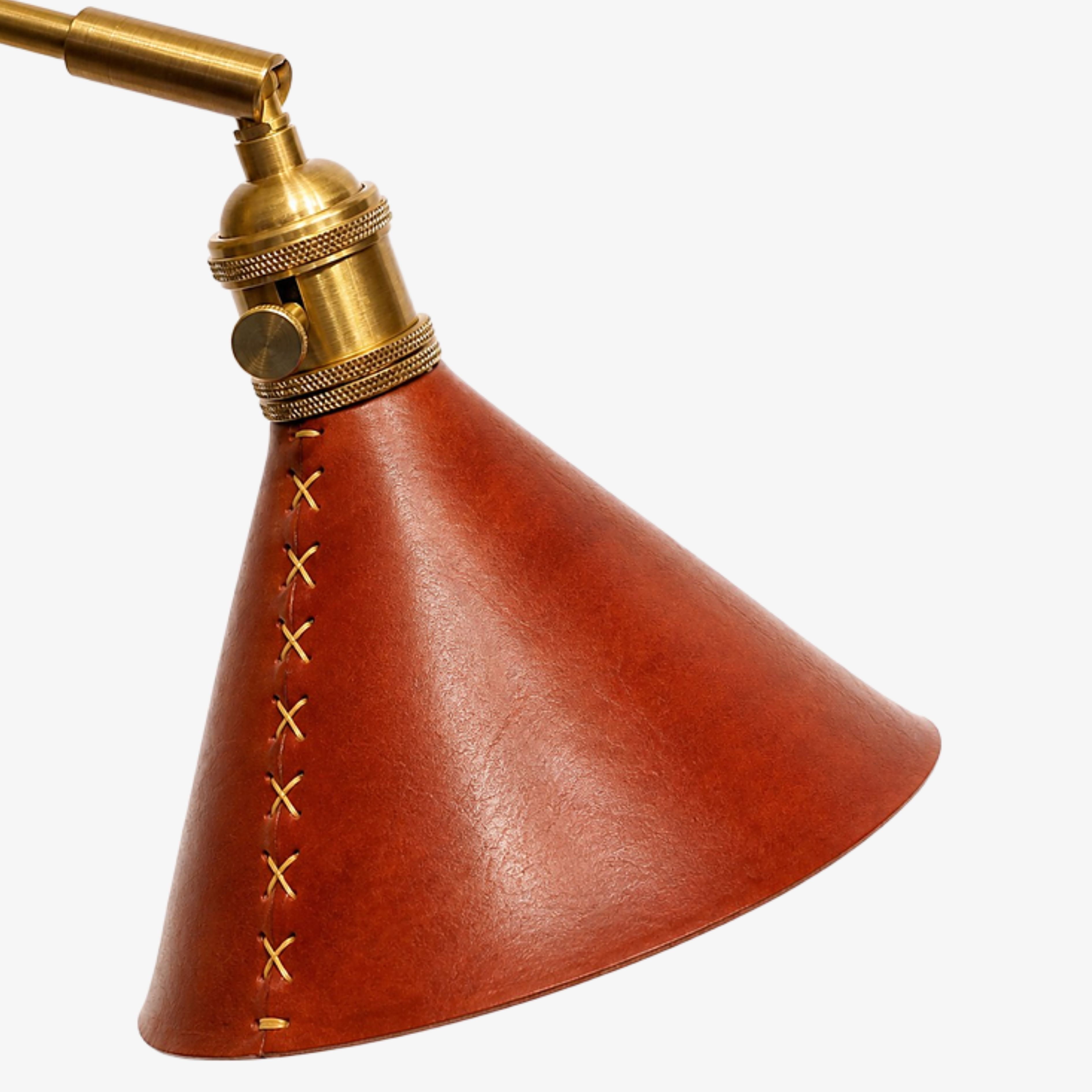 Cross-stitched leather cone shade and brass socket
