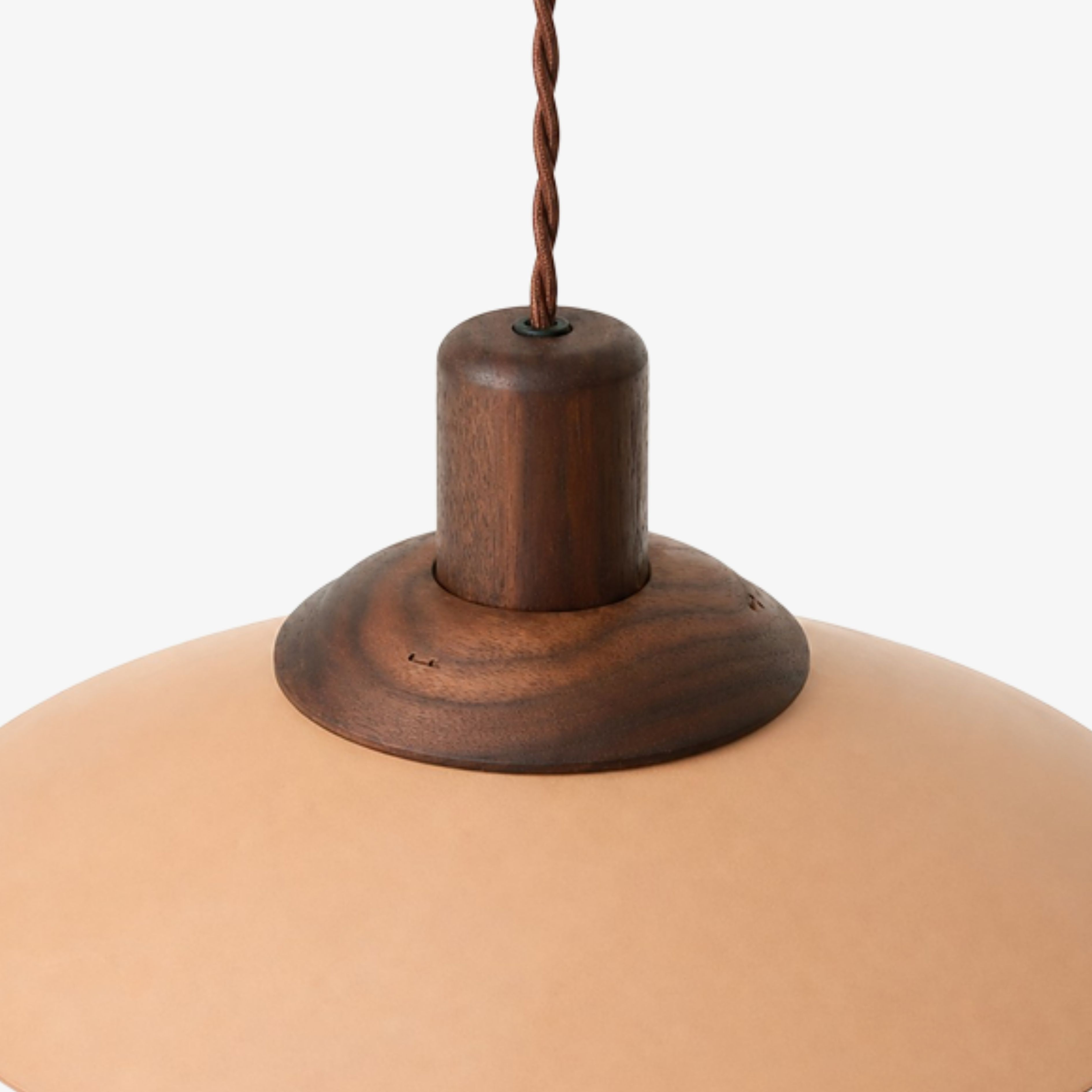 Solid wood cap and twisted suspension cord