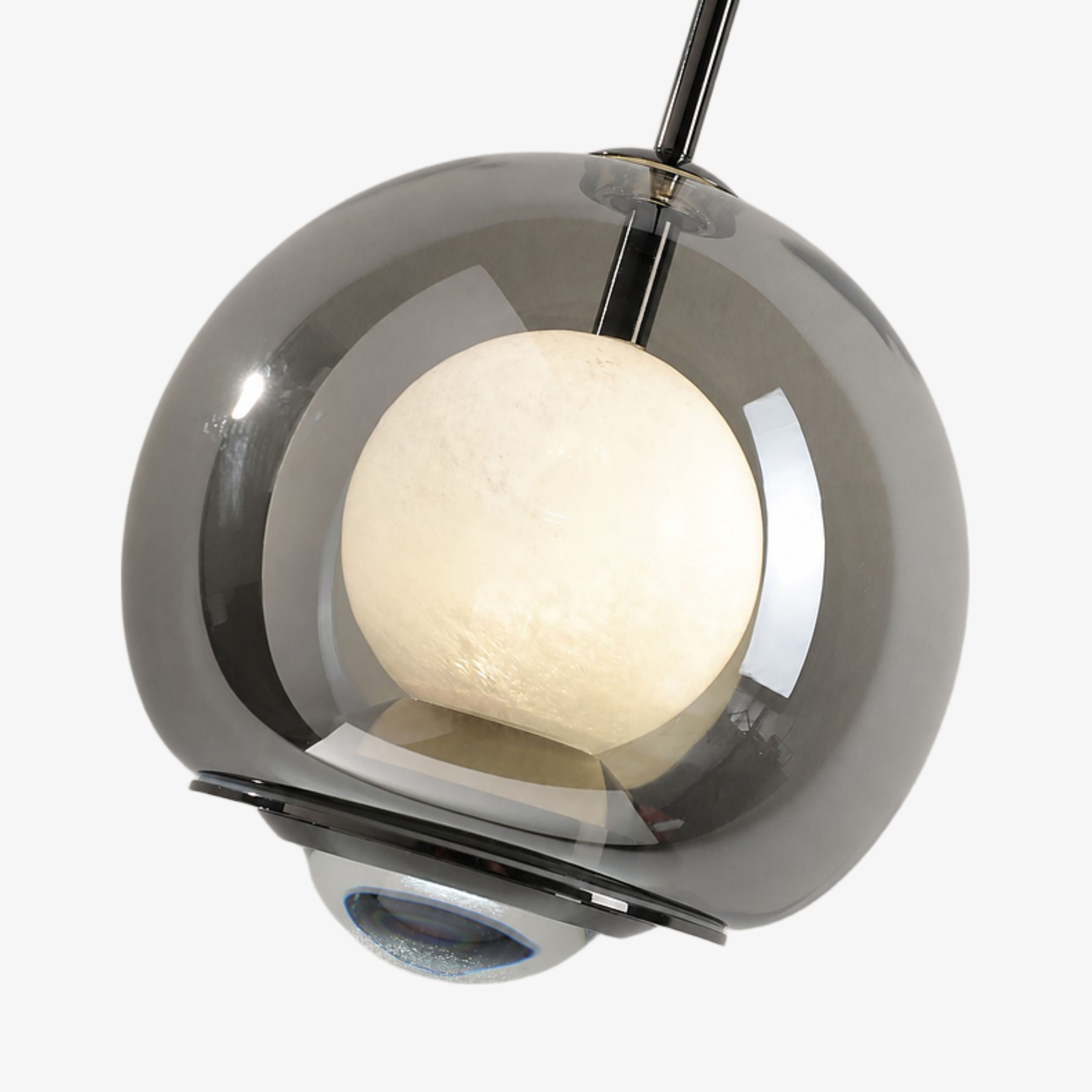 Close view of the smoked outer globe and glowing inner sphere