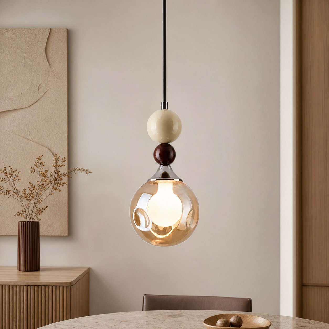 Cream glass pendant above a console and table