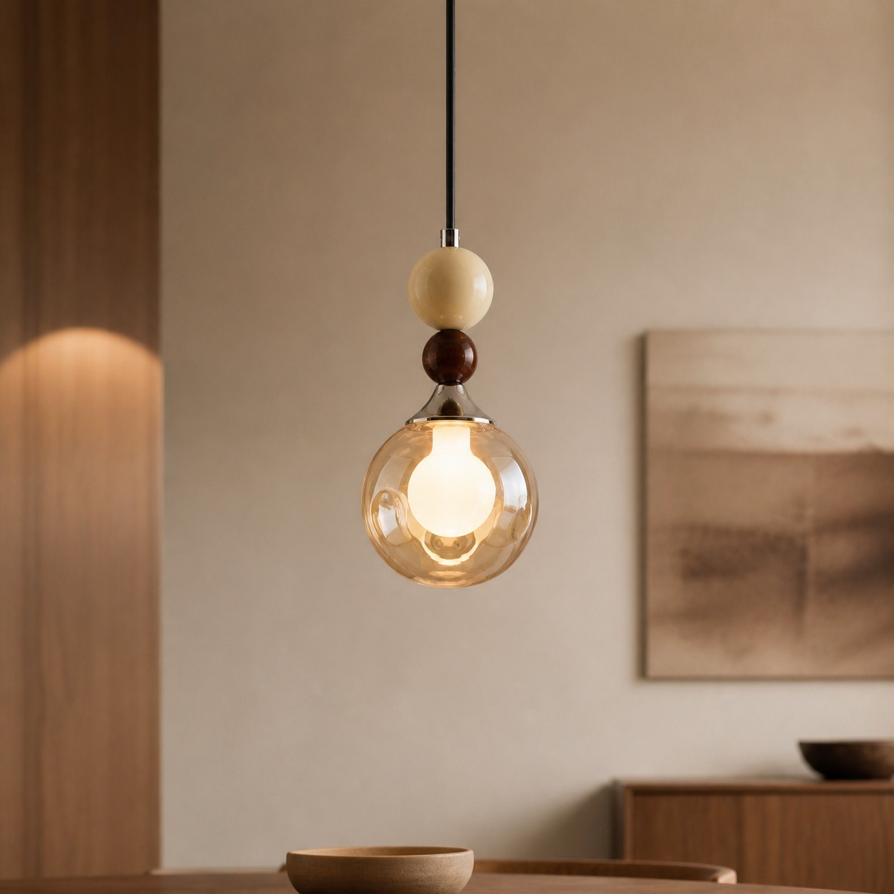 Cream glass pendant in a warm wood interior