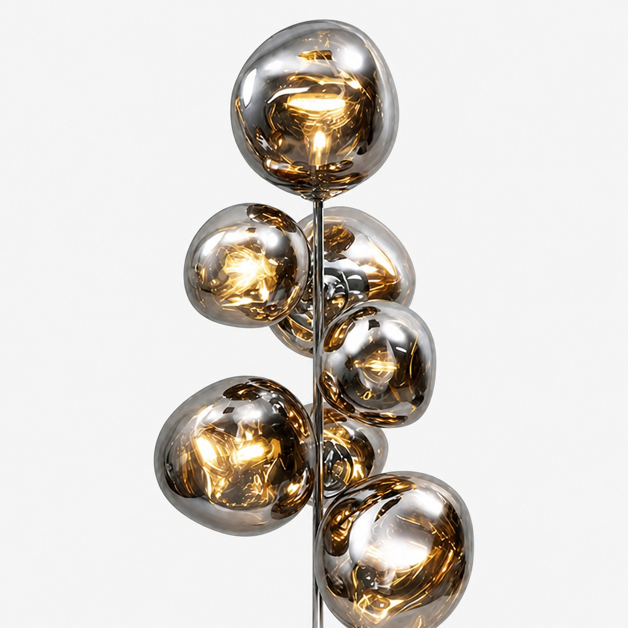 Warm illuminated mirrored globe cluster detail