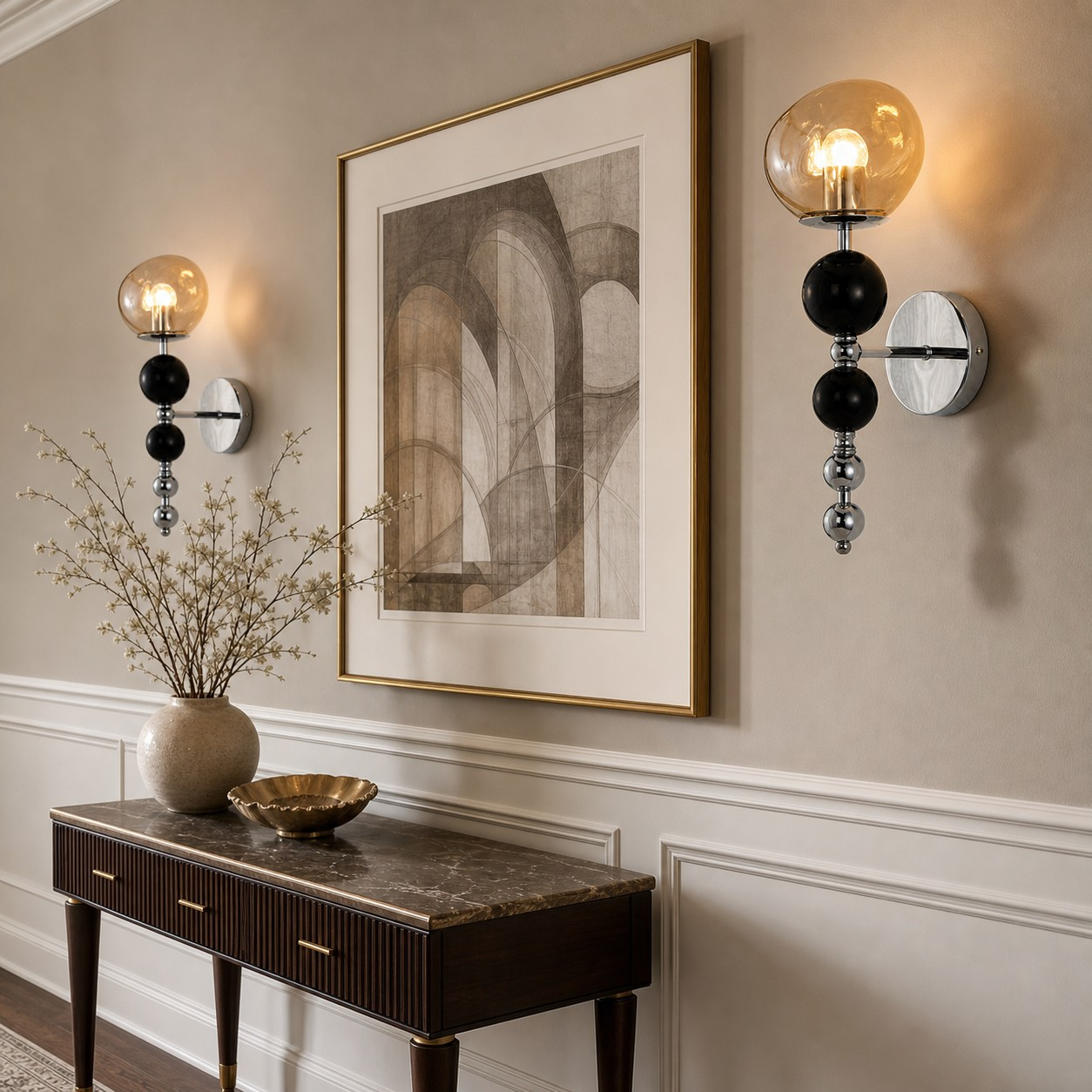 Amber stacked orb wall lamps above a console