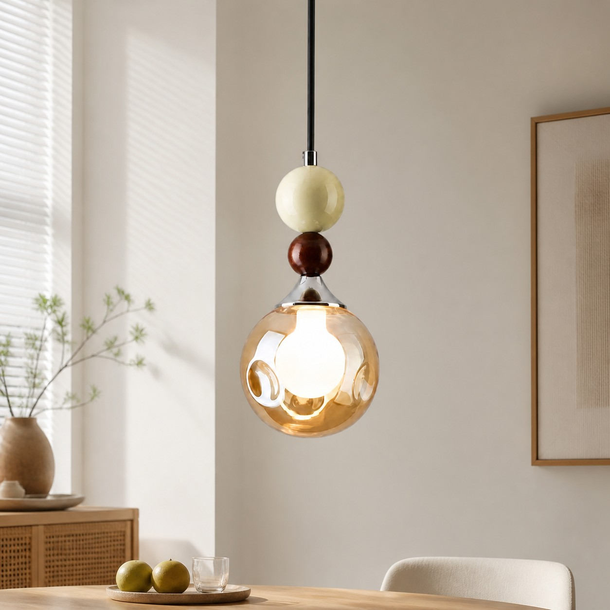 Cream glass pendant above a dining table