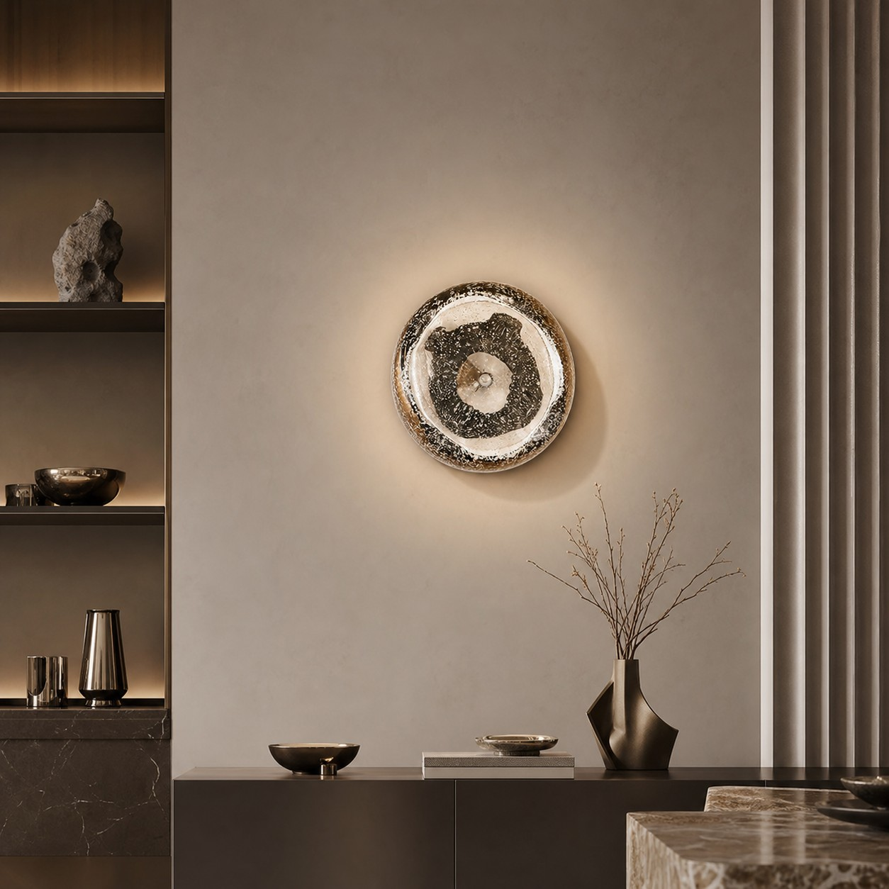 Clear crystal globe wall lamp above a console