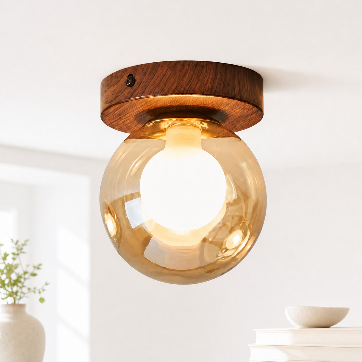 Amber glass wall lamp in a bedroom