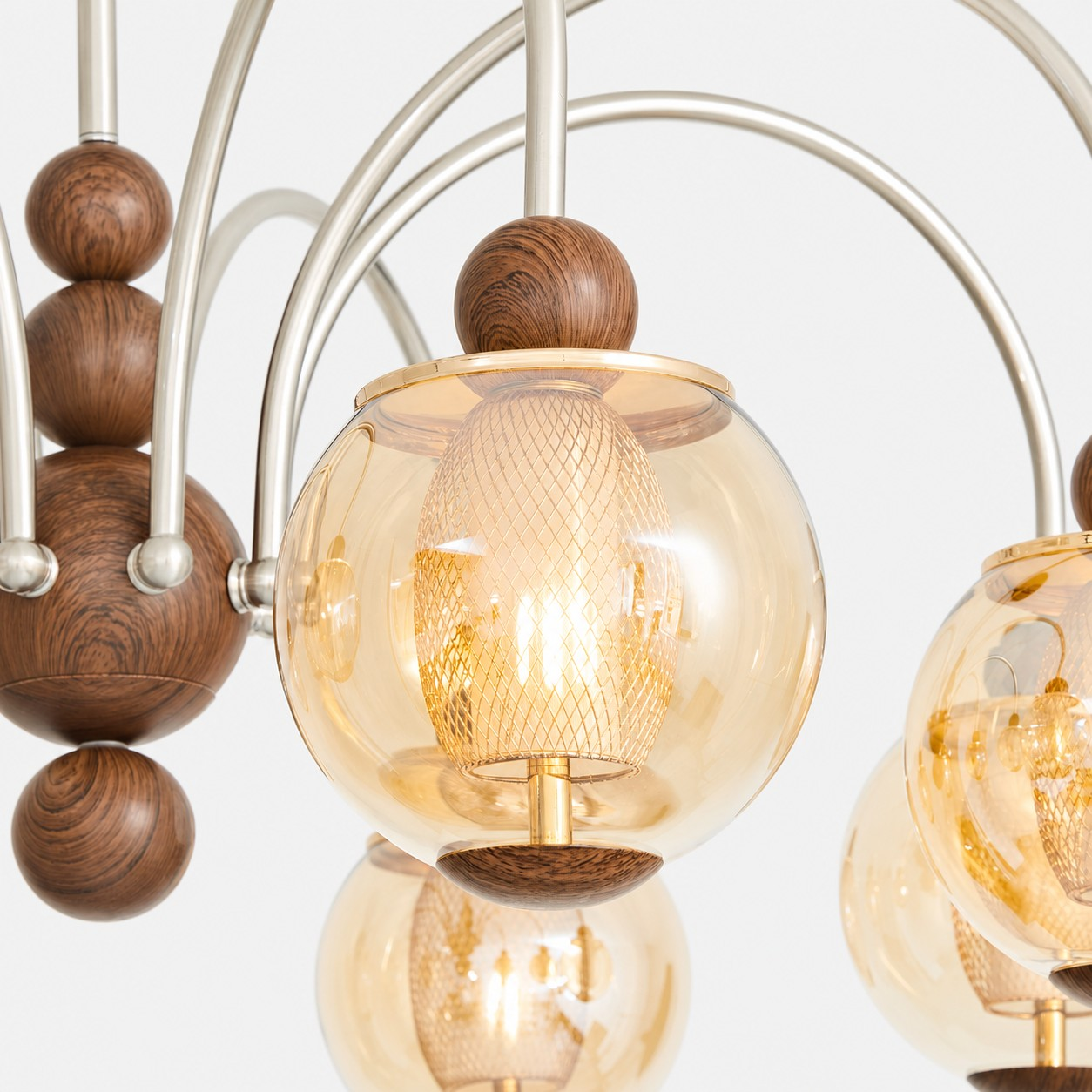 Amber glass globe and mesh diffuser detail