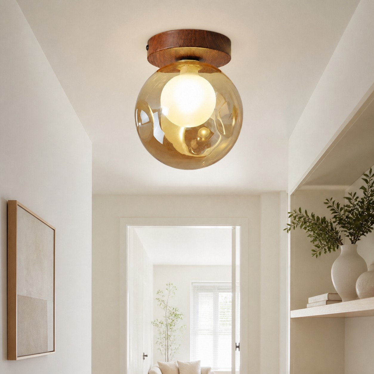 Single-head amber globe ceiling light in a bright hallway
