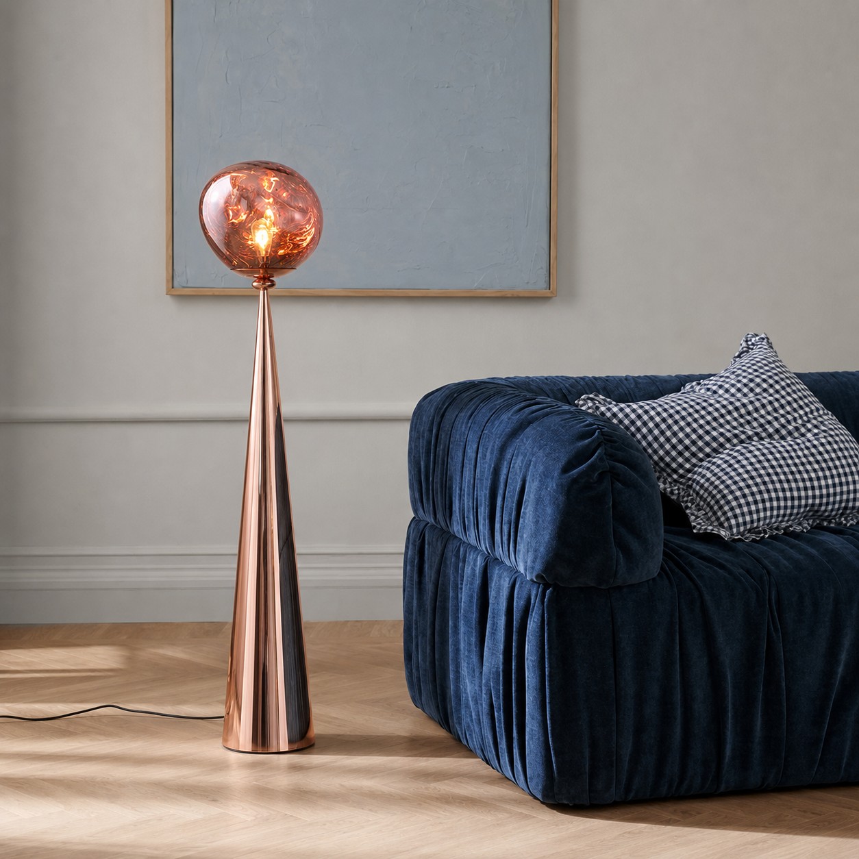 Rose gold Melt floor lamp beside seating