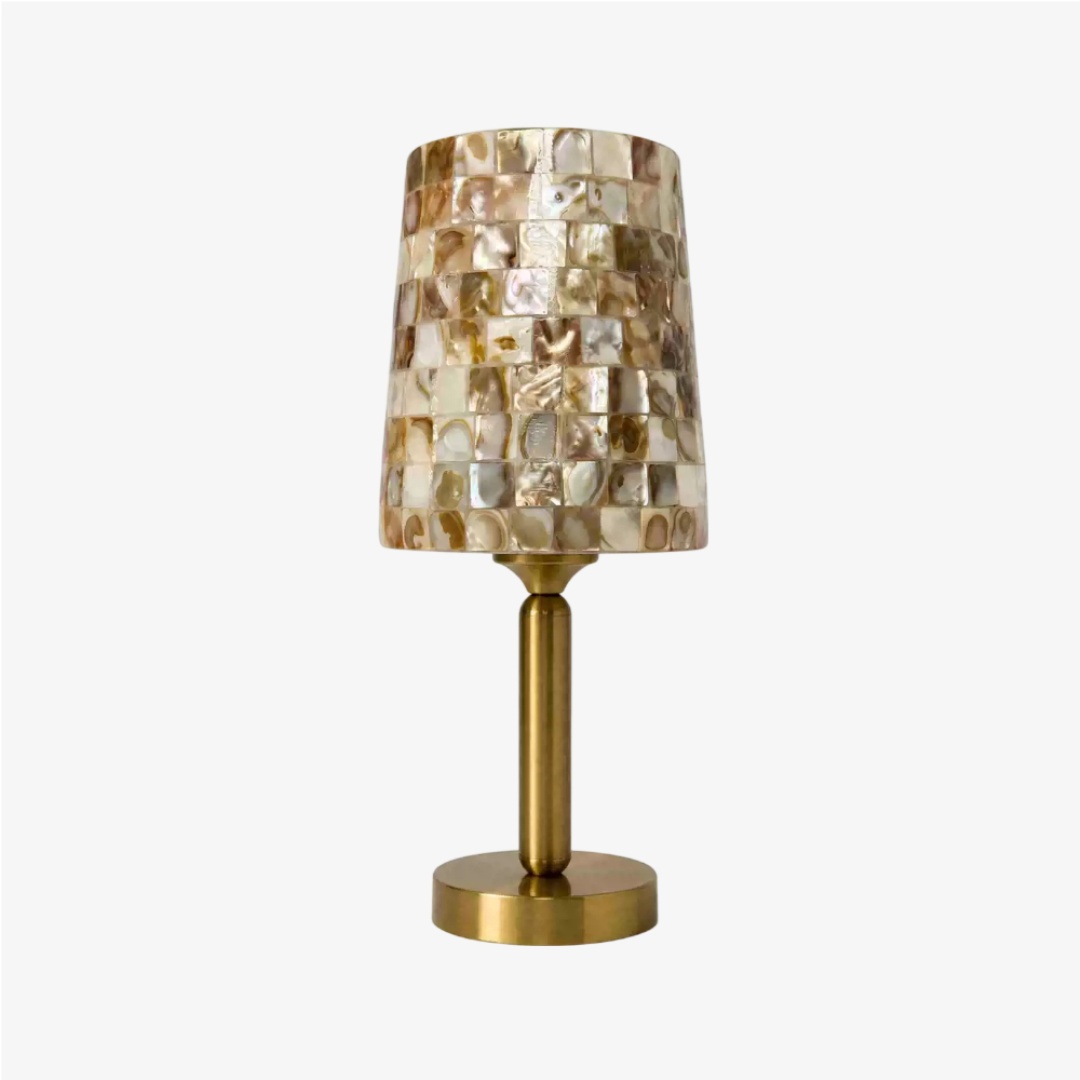 Beige Capiz shell mosaic table lamp on a clean background