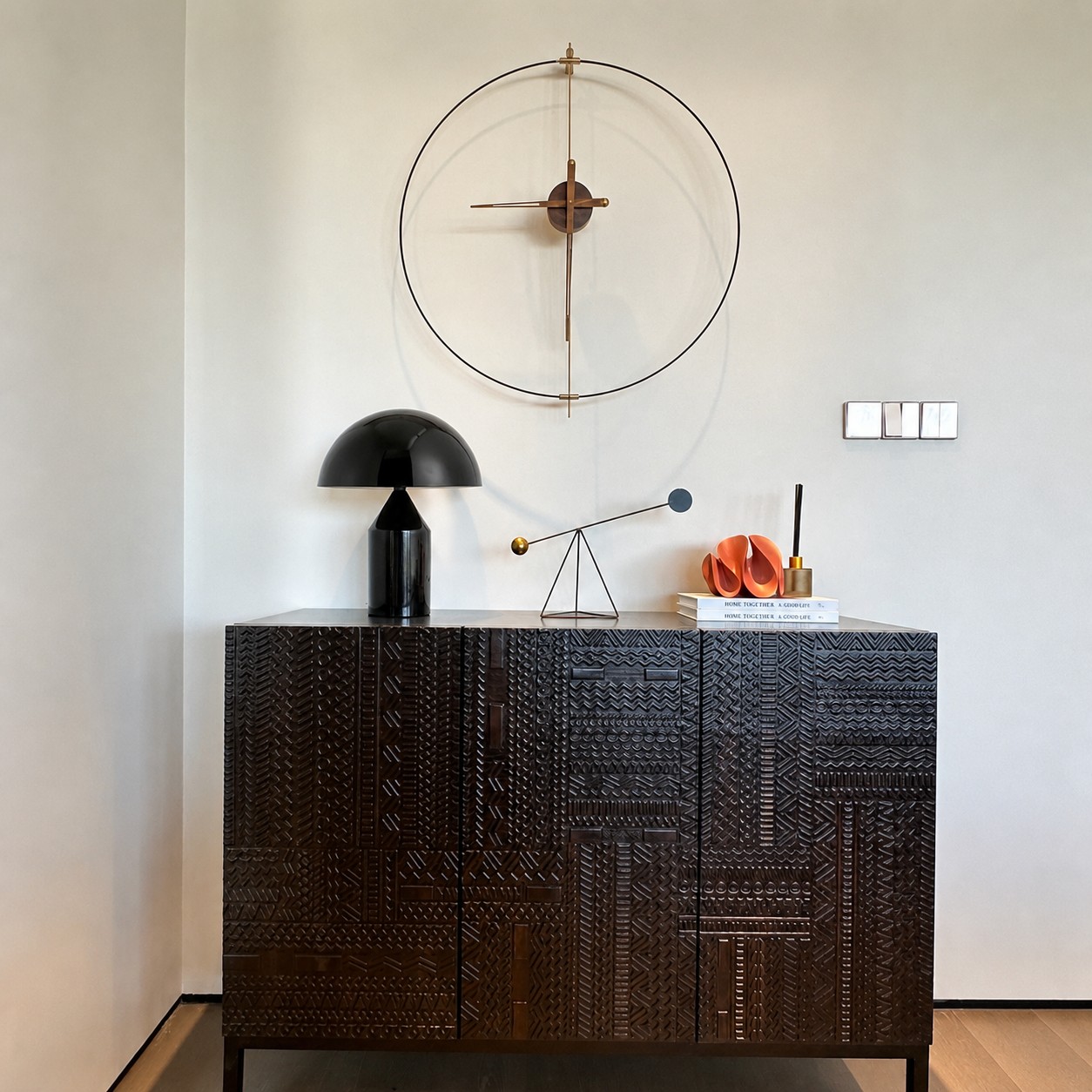 Bright black HaloVell lamp on a dark console