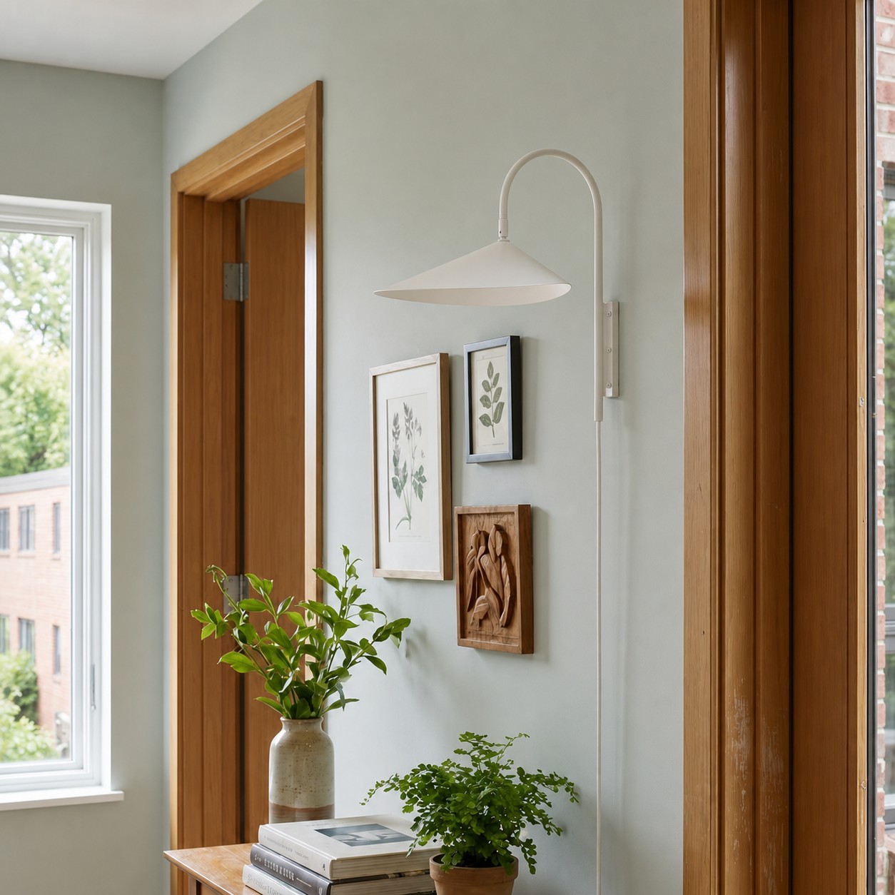 Black Arum wall lamp above a desk